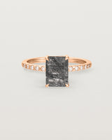 Front view of the Una Emerald solitaire with tourmalinated quartz featuring white diamond shoulders, in rose gold.