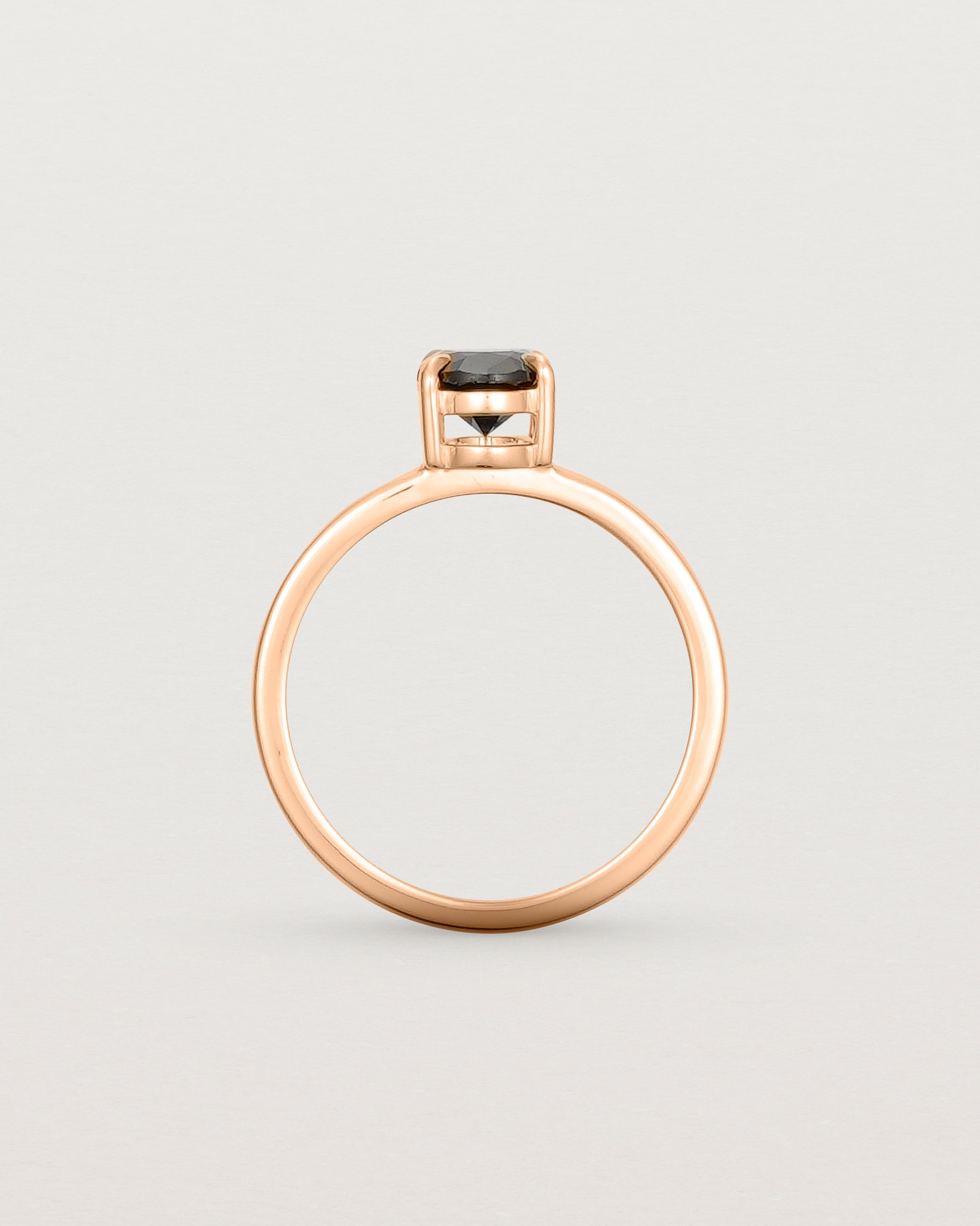 Standing view of the Una Oval Solitaire | Black Spinel | Rose Gold.