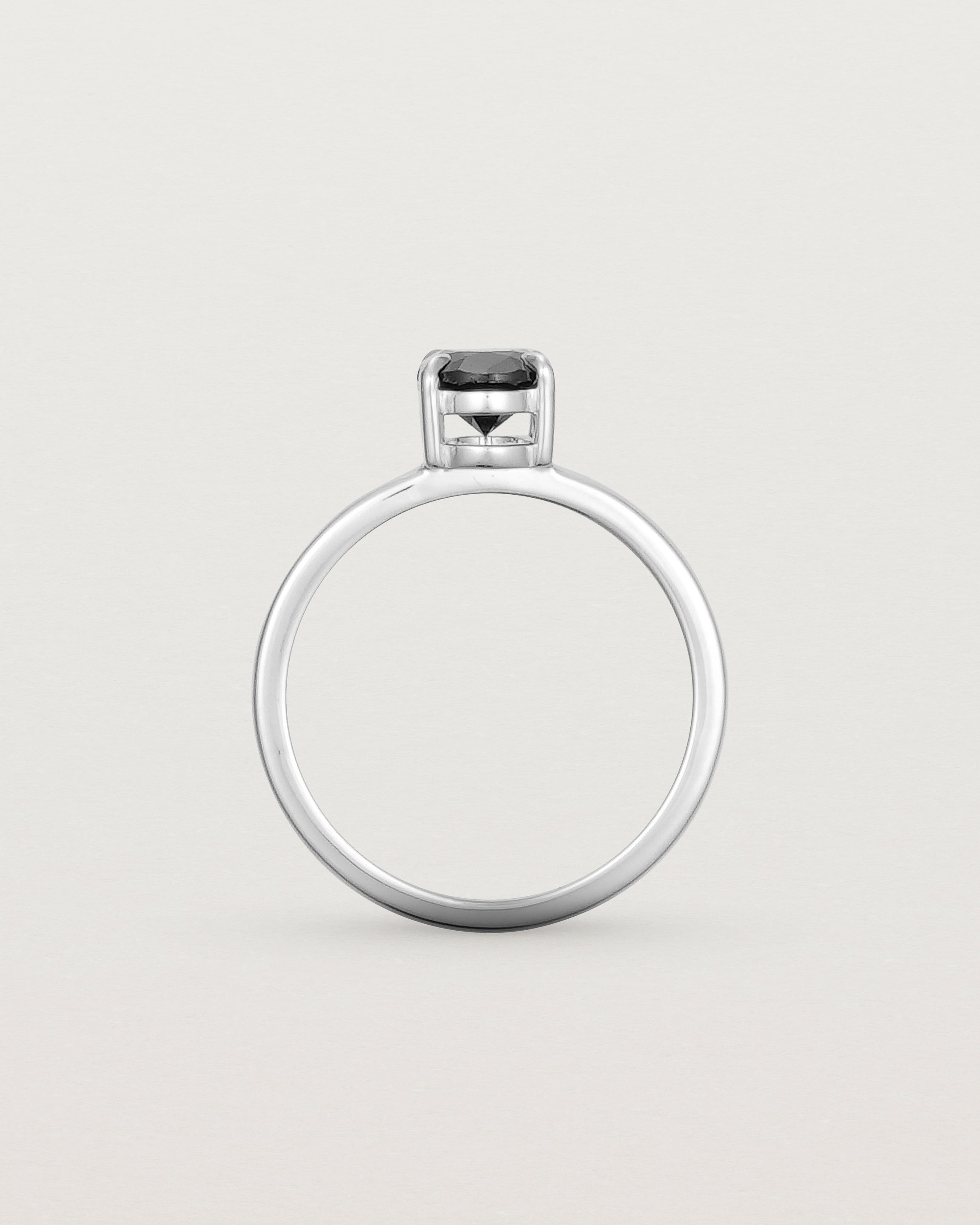 Standing view of the Una Oval Solitaire | Black Spinel | White Gold.