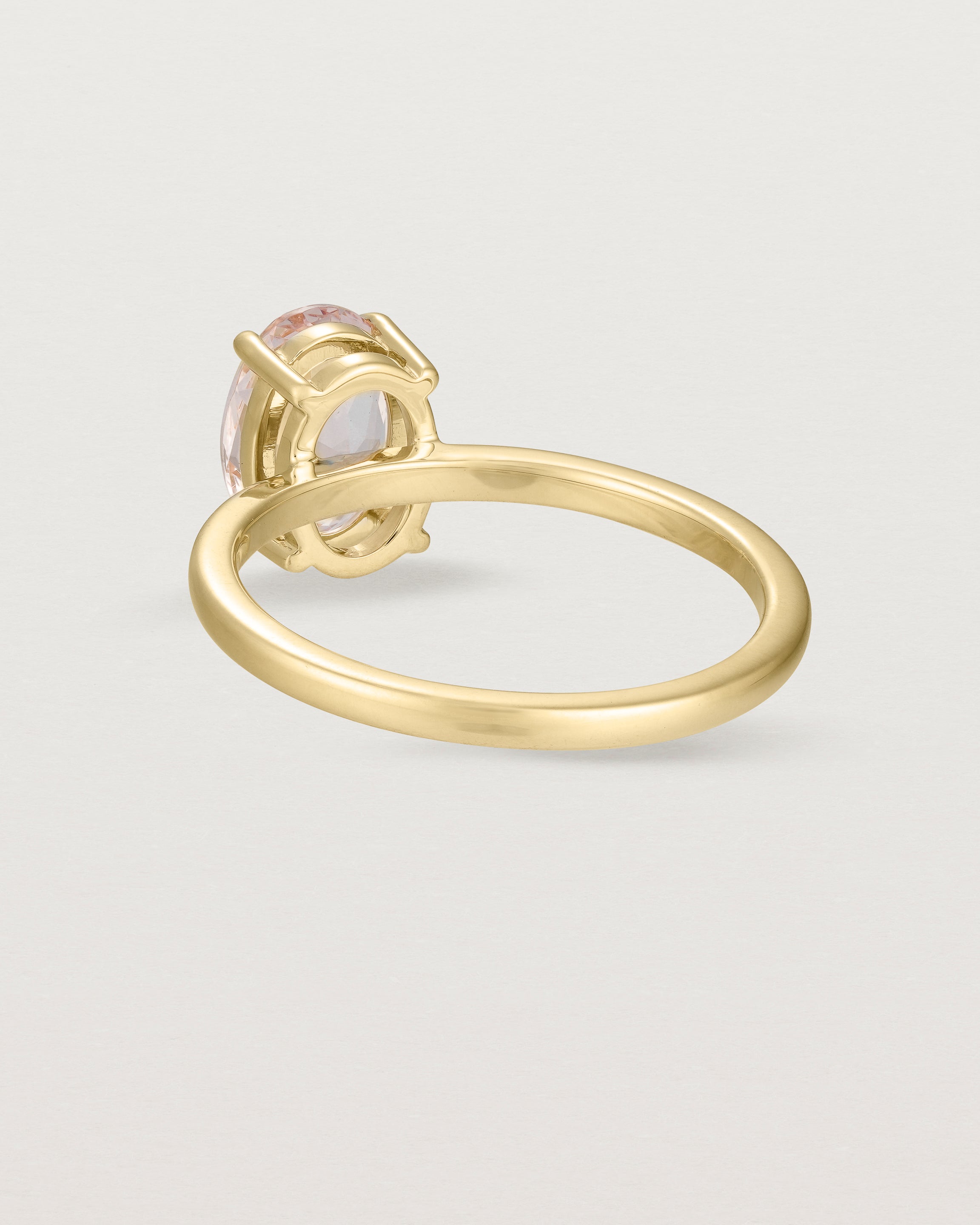 Back view of the Una Oval Solitaire | Morganite | Yellow Gold.