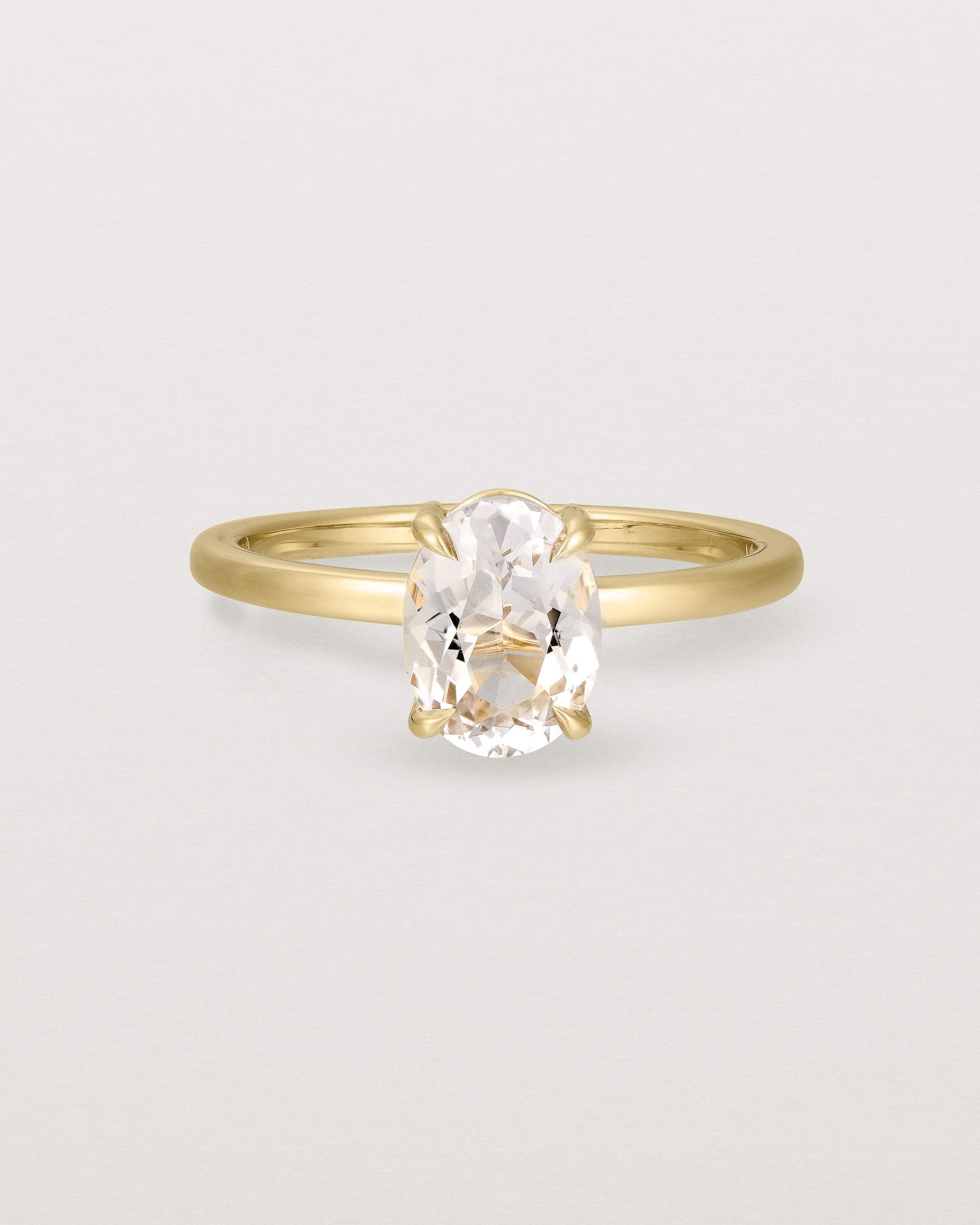 Front view of the Una Oval Solitaire | Morganite | Yellow Gold.