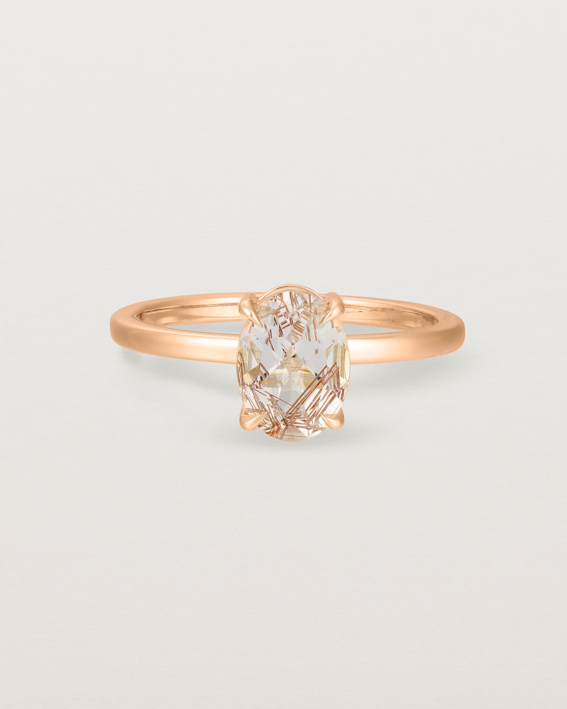 Front view of the Una Oval Solitaire | Rutilated Quartz | Rose Gold.