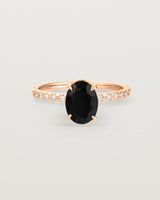 Front view of the Una Oval Solitaire | Black Spinel | Rose Gold with Cascade Shoulders.
