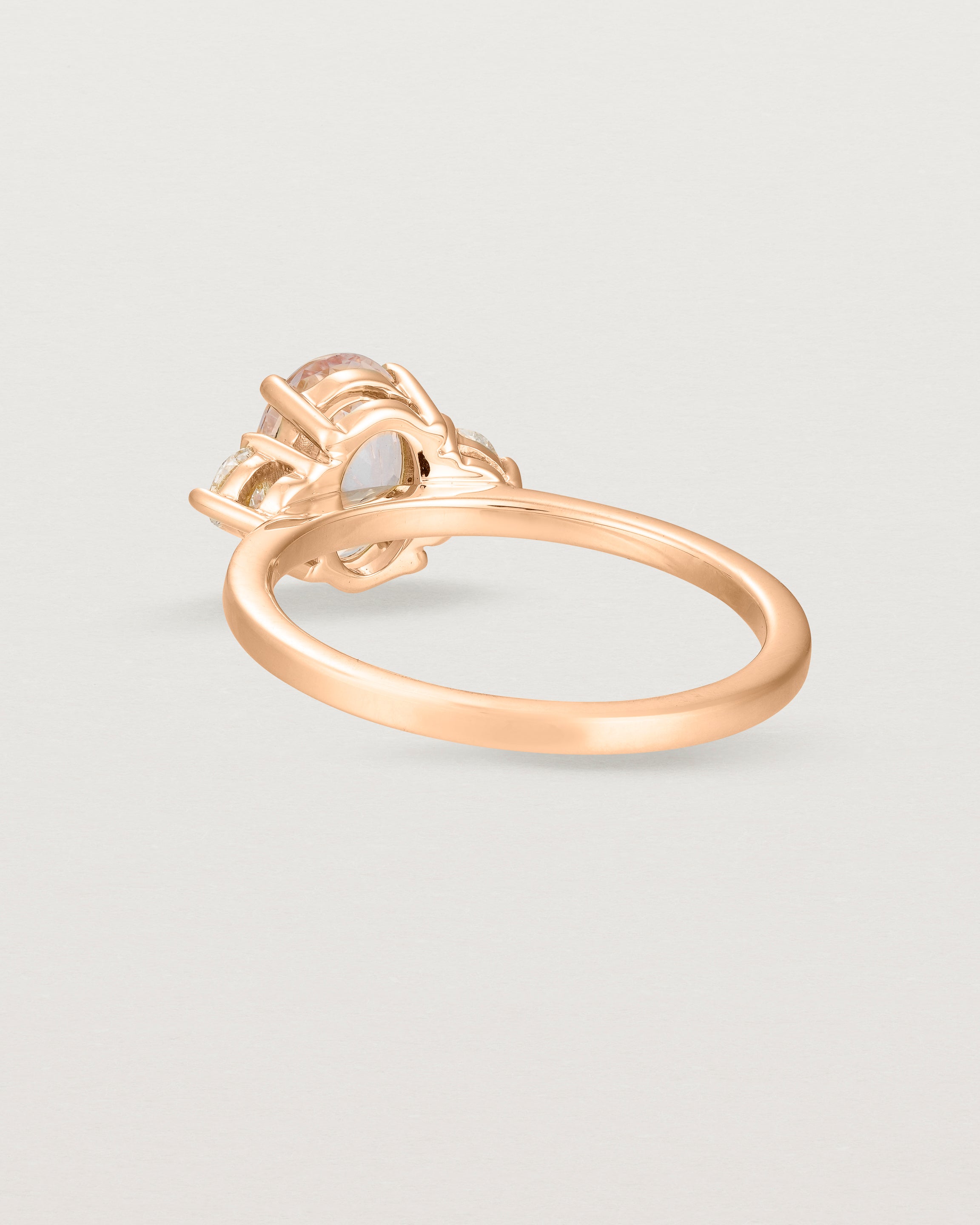 Back view of the Una Oval Trio Ring | Morganite & Diamonds | Rose Gold.Front view of the Una Oval Trio Ring | Morganite & Diamonds | Rose Gold.