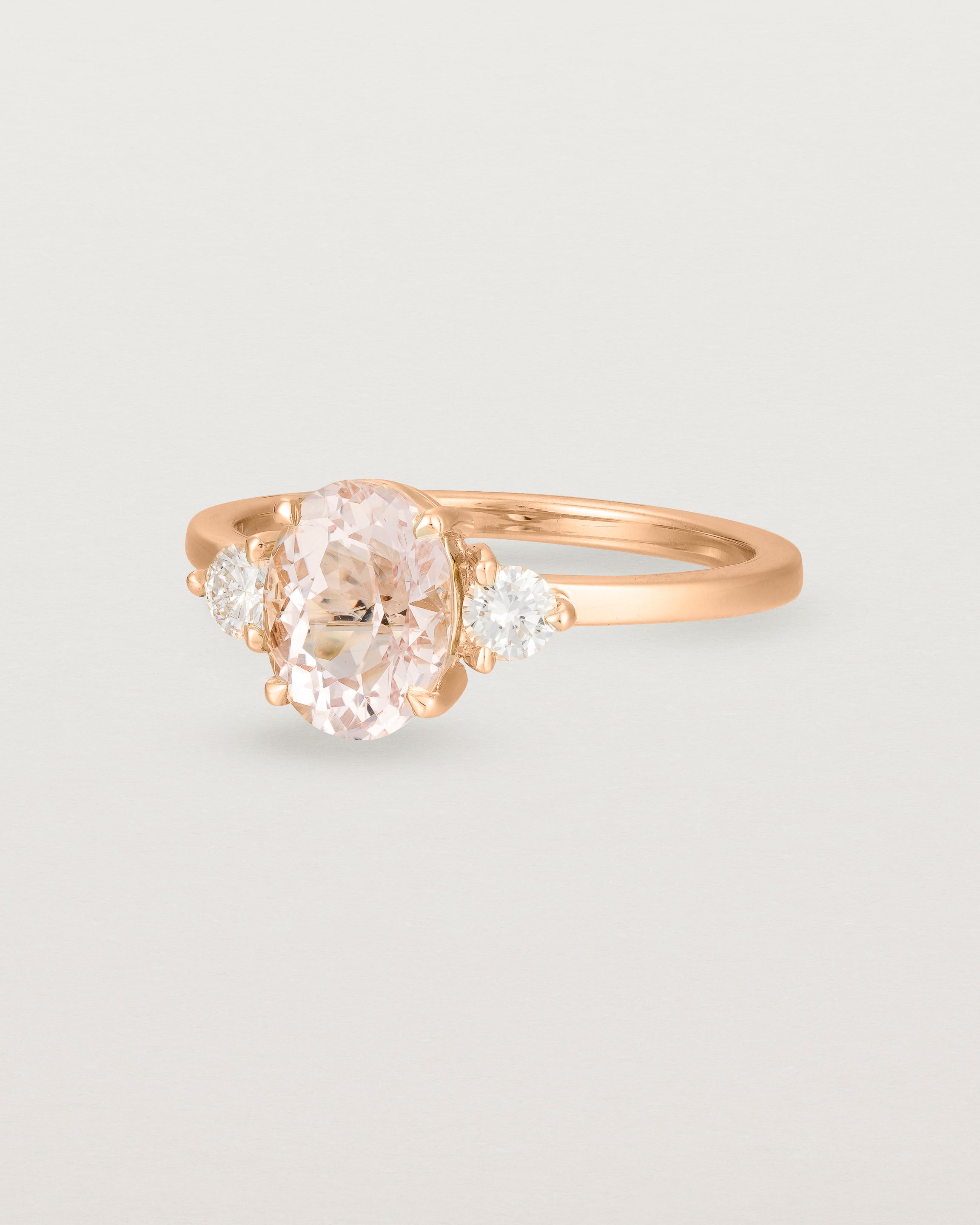 Angled view of the Una Oval Trio Ring | Morganite & Diamonds | Rose Gold.