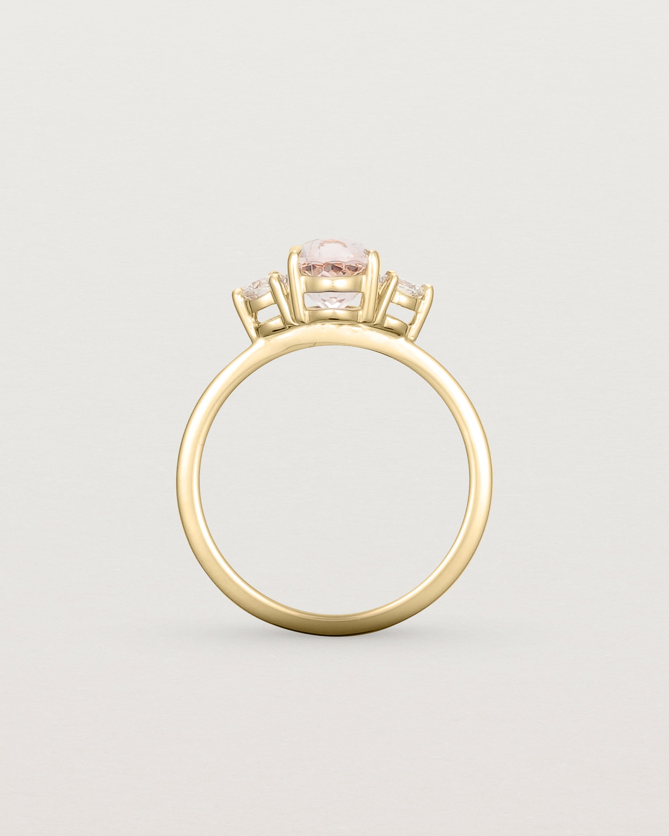 Standing view of the Una Oval Trio Ring | Morganite & Diamonds | Yellow Gold.