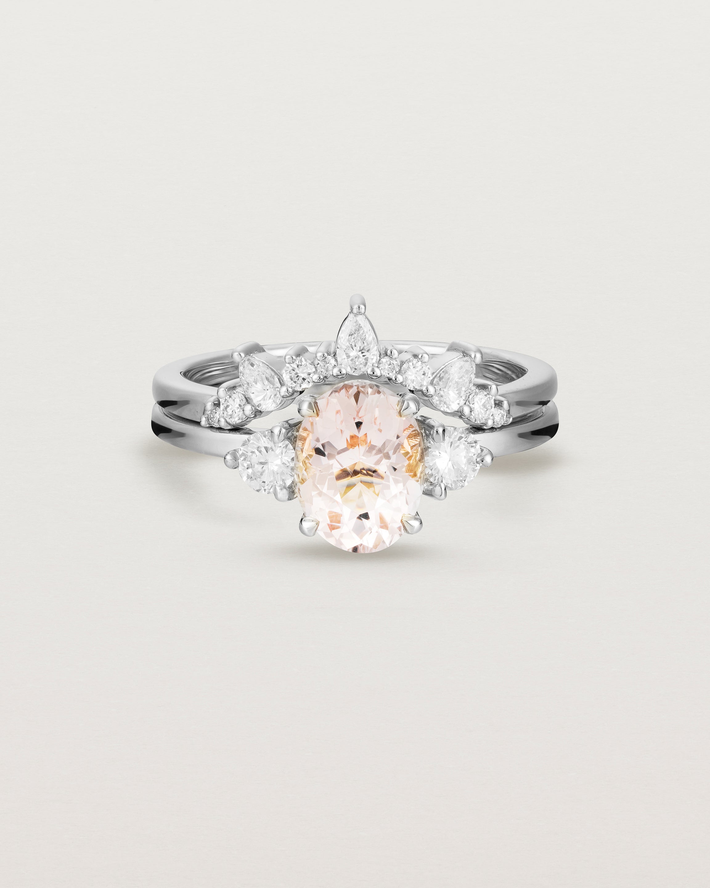 Front view of the Una Oval Trio Ring | Morganite & Diamonds | White Gold stacked with the Odette Crown Ring.