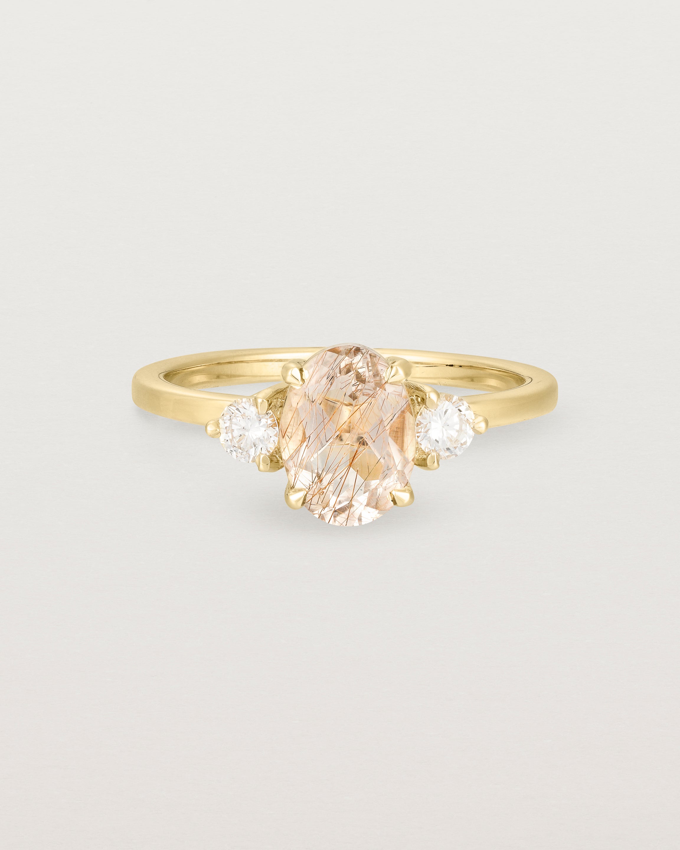 Front view of the Una Oval Trio Ring | Rutilated Quartz & Diamonds | Yellow Gold.