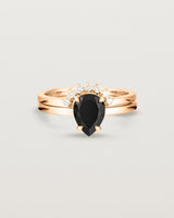 Front view of the Una Pear Solitaire | Black Spinel | Rose Gold stacked with the Reina Crown Ring | Diamonds.