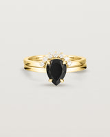 Front view of the Una Pear Solitaire | Black Spinel | Yellow Gold stacked with the Reina Crown Ring | Diamonds.