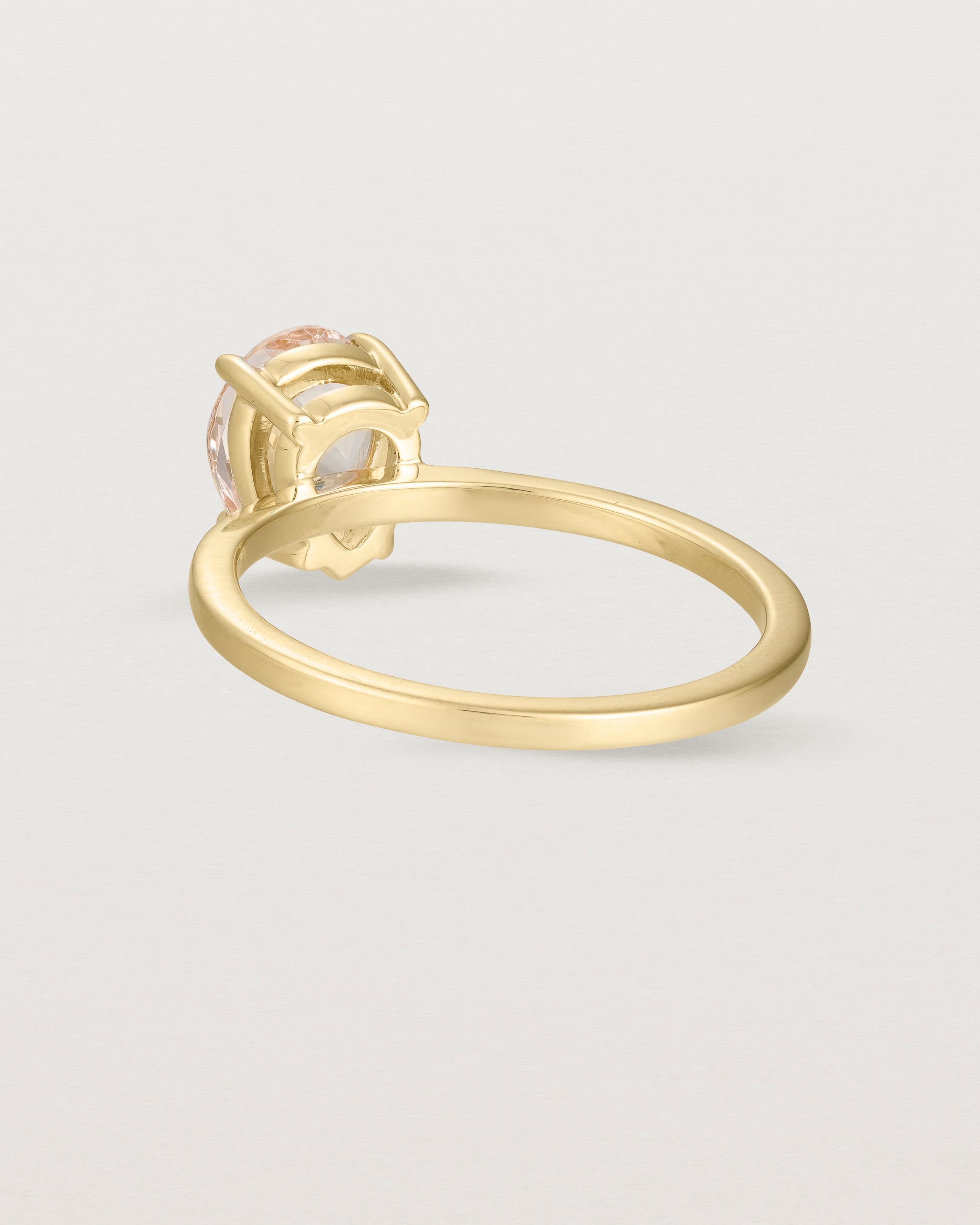 Back view of the Una Pear Solitaire | Morganite | Yellow Gold.