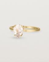 Angled view of the Una Pear Solitaire | Morganite | Yellow Gold.