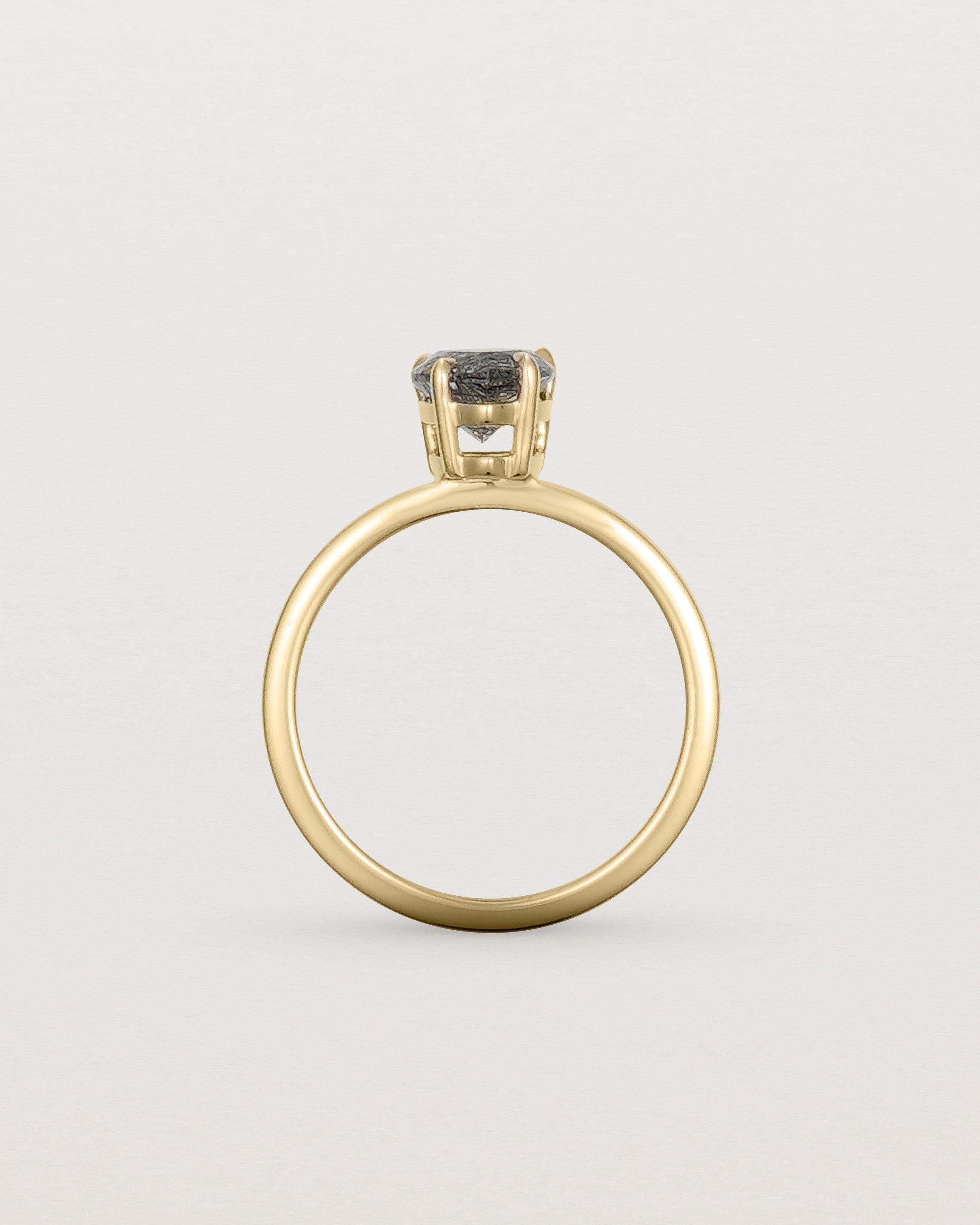 Standing view of the Una Pear Solitaire | Tourmalinated Quartz | Yellow Gold.