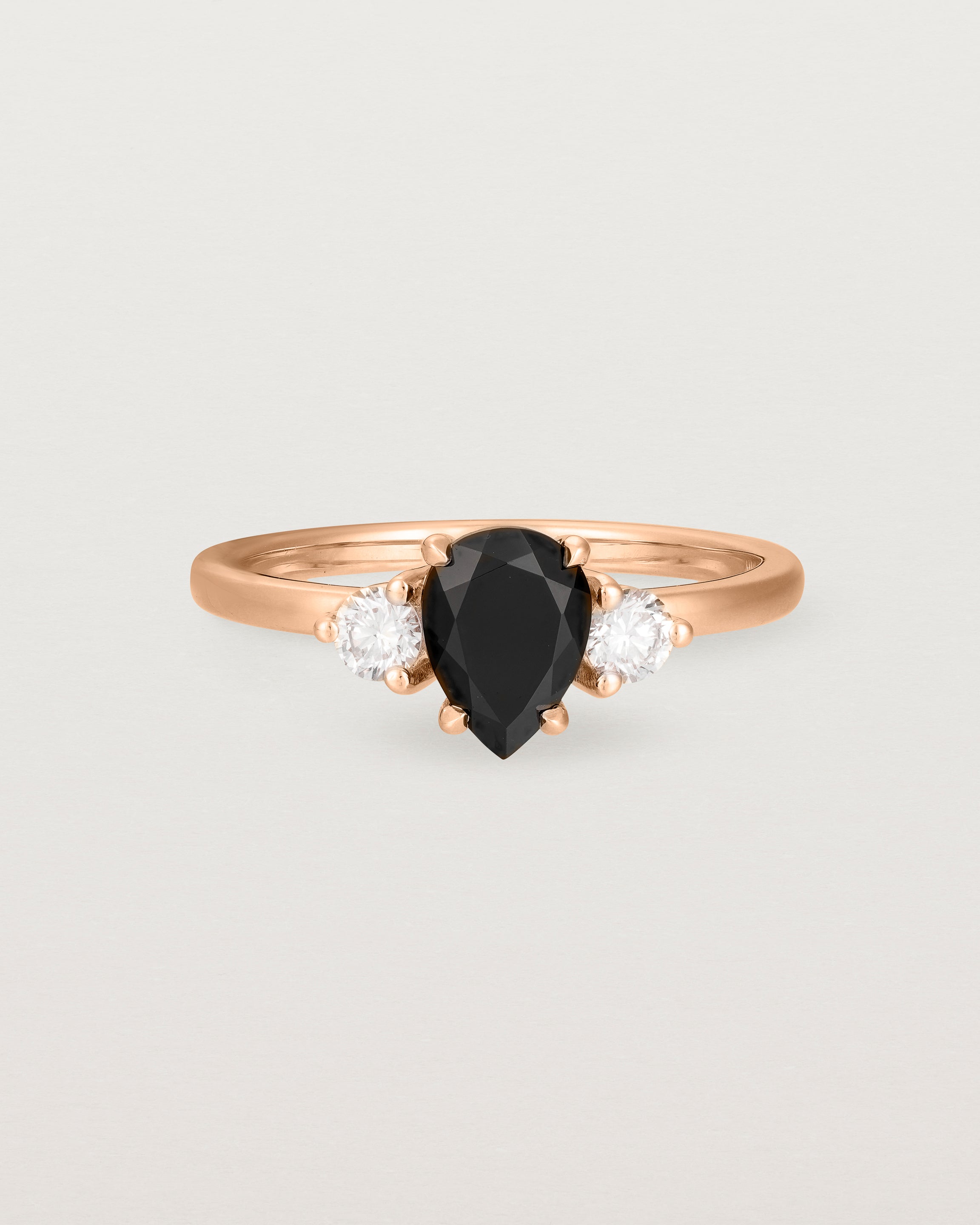 Front view of the Una Pear Trio Ring | Black Spinel & Diamonds | Rose Gold.