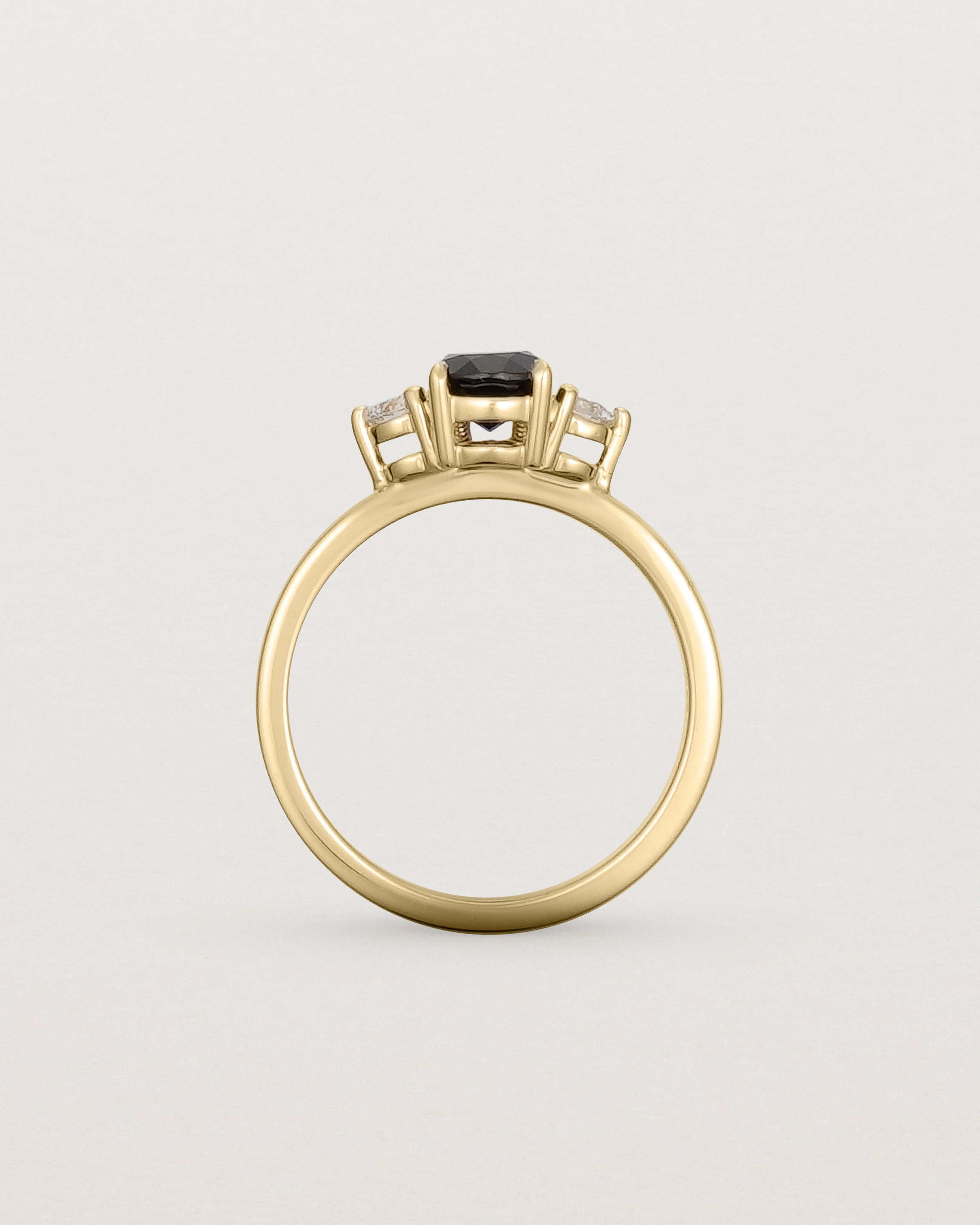 Standing view of the Una Pear Trio Ring | Black Spinel & Diamonds | Yellow Gold.