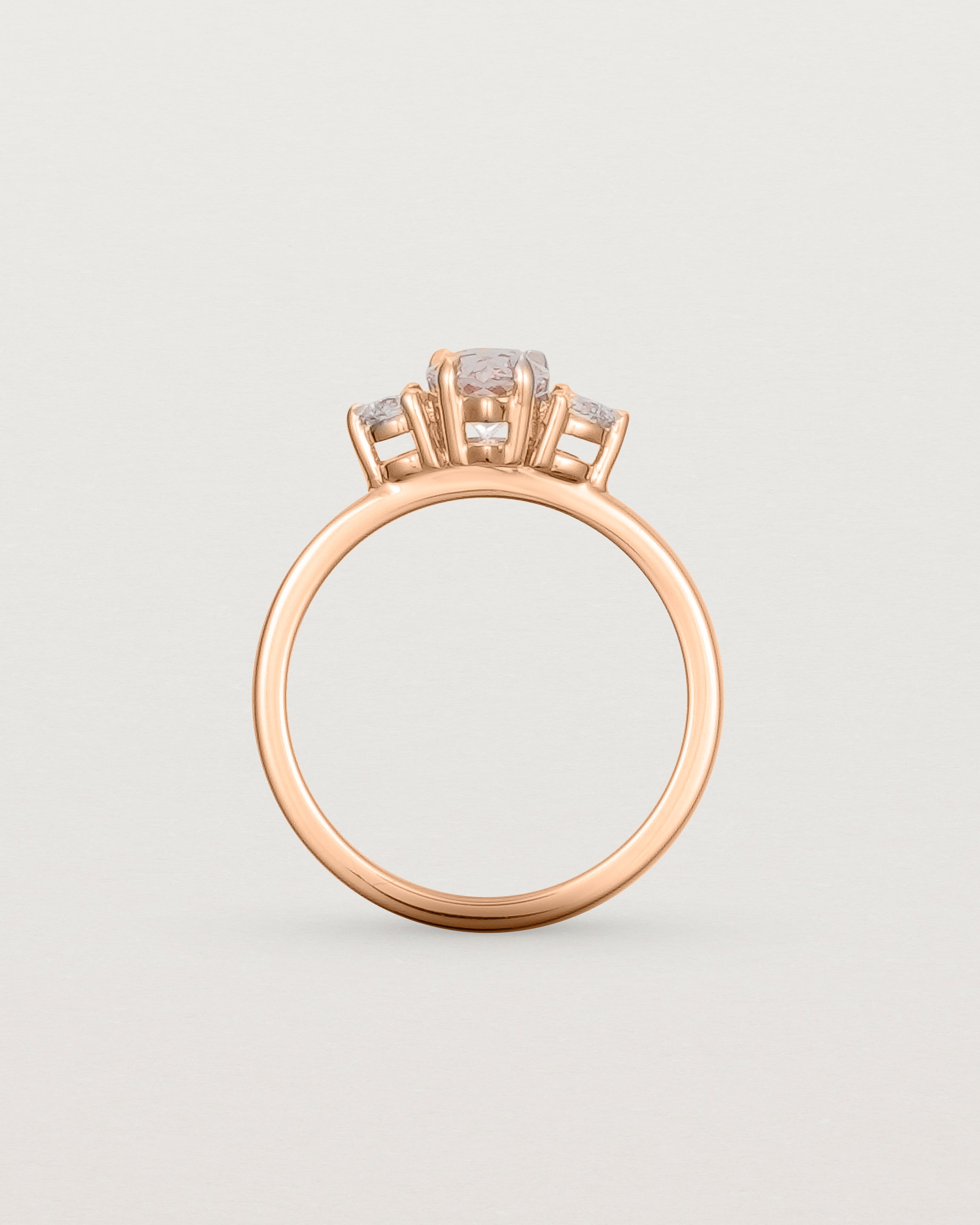Standing view of the Una Pear Trio Ring | Morganite & Diamonds | Rose Gold.