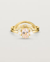 Front view of the Una Pear Trio Ring | Morganite & Diamonds | Yellow Gold stacked with the Evette Crown Ring. 