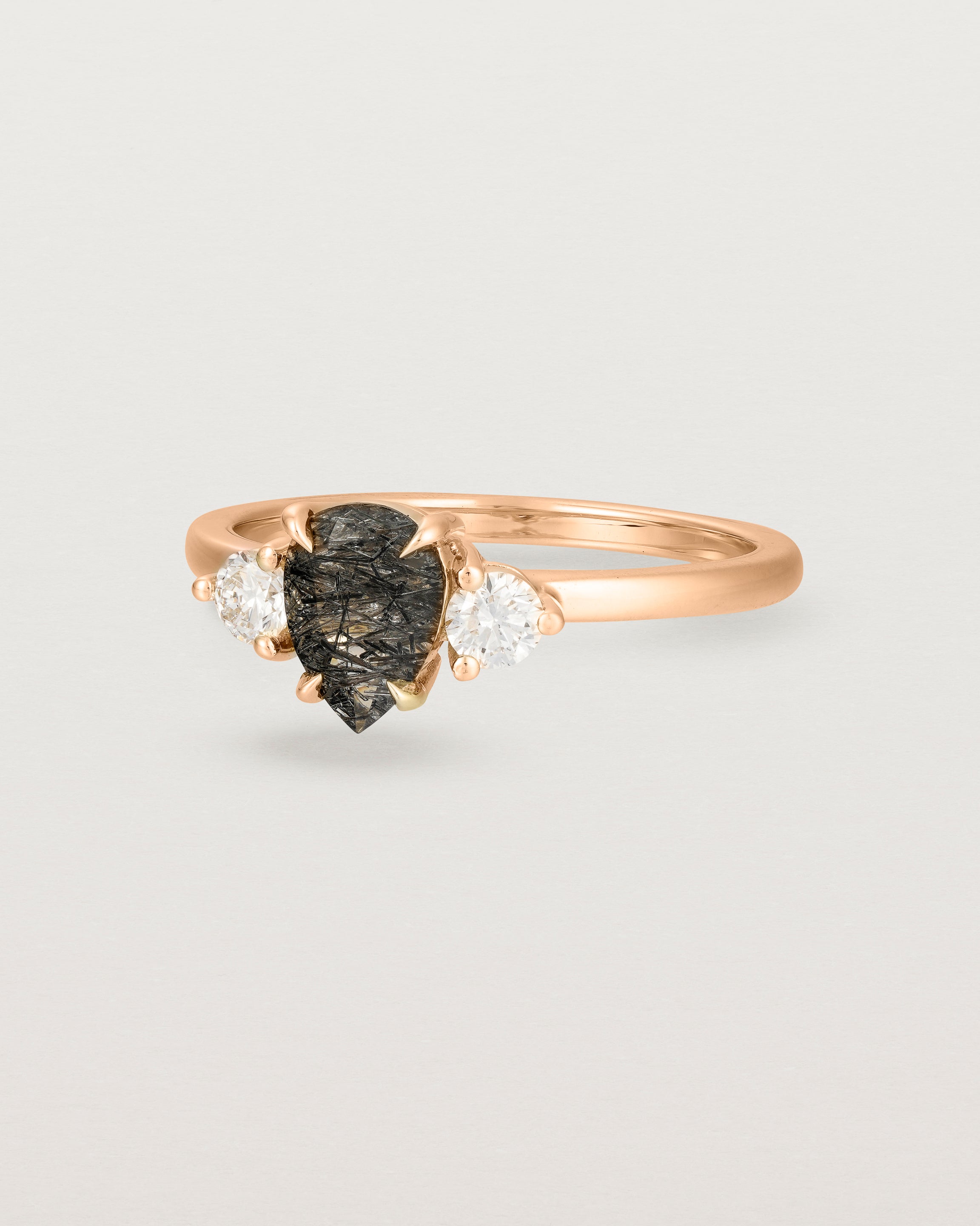 Angled view of the Una Pear Trio Ring | Tourmalinated Quartz & Diamonds | Rose Gold.