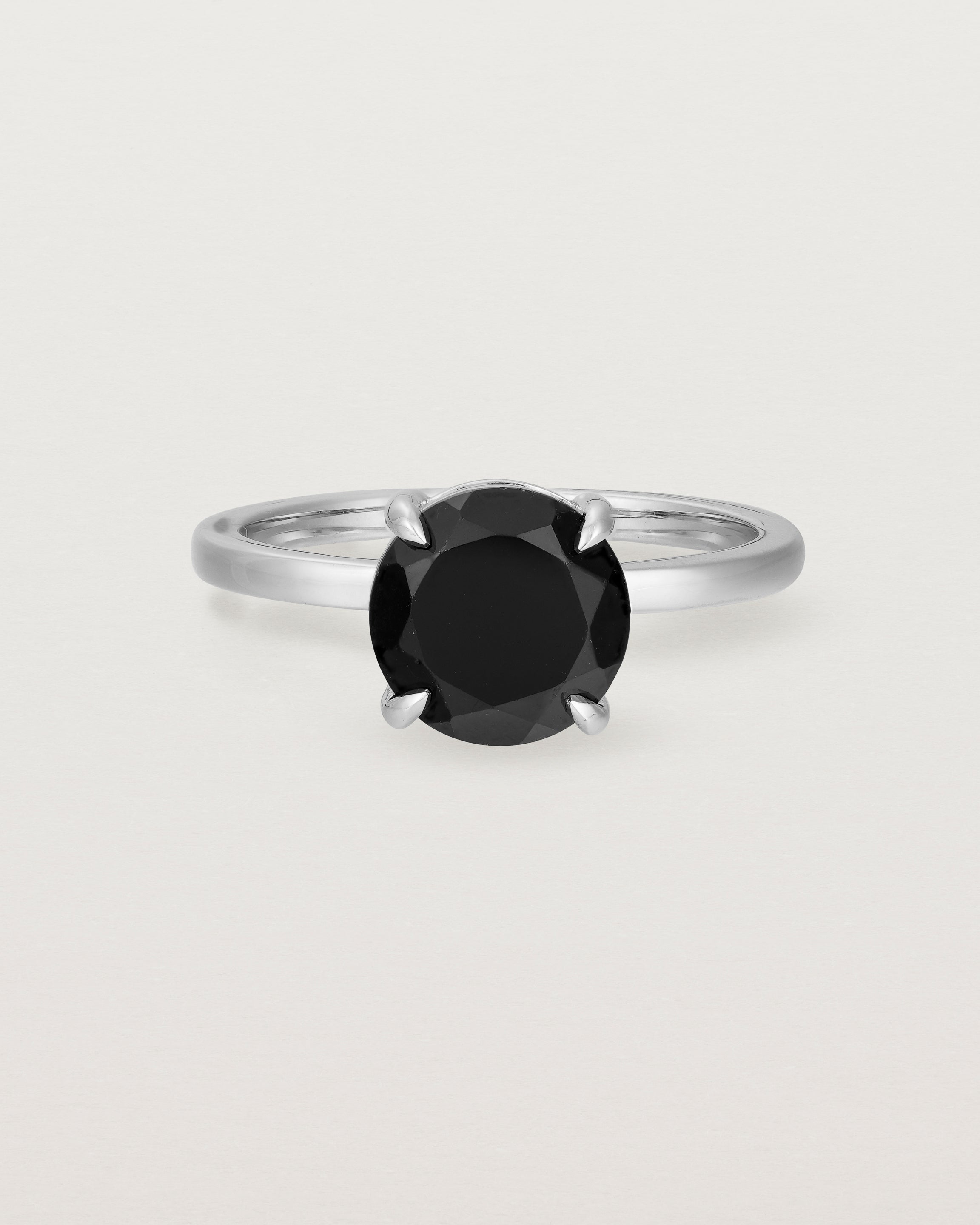 Front view of the Una Round Solitaire | Black Spinel | White Gold