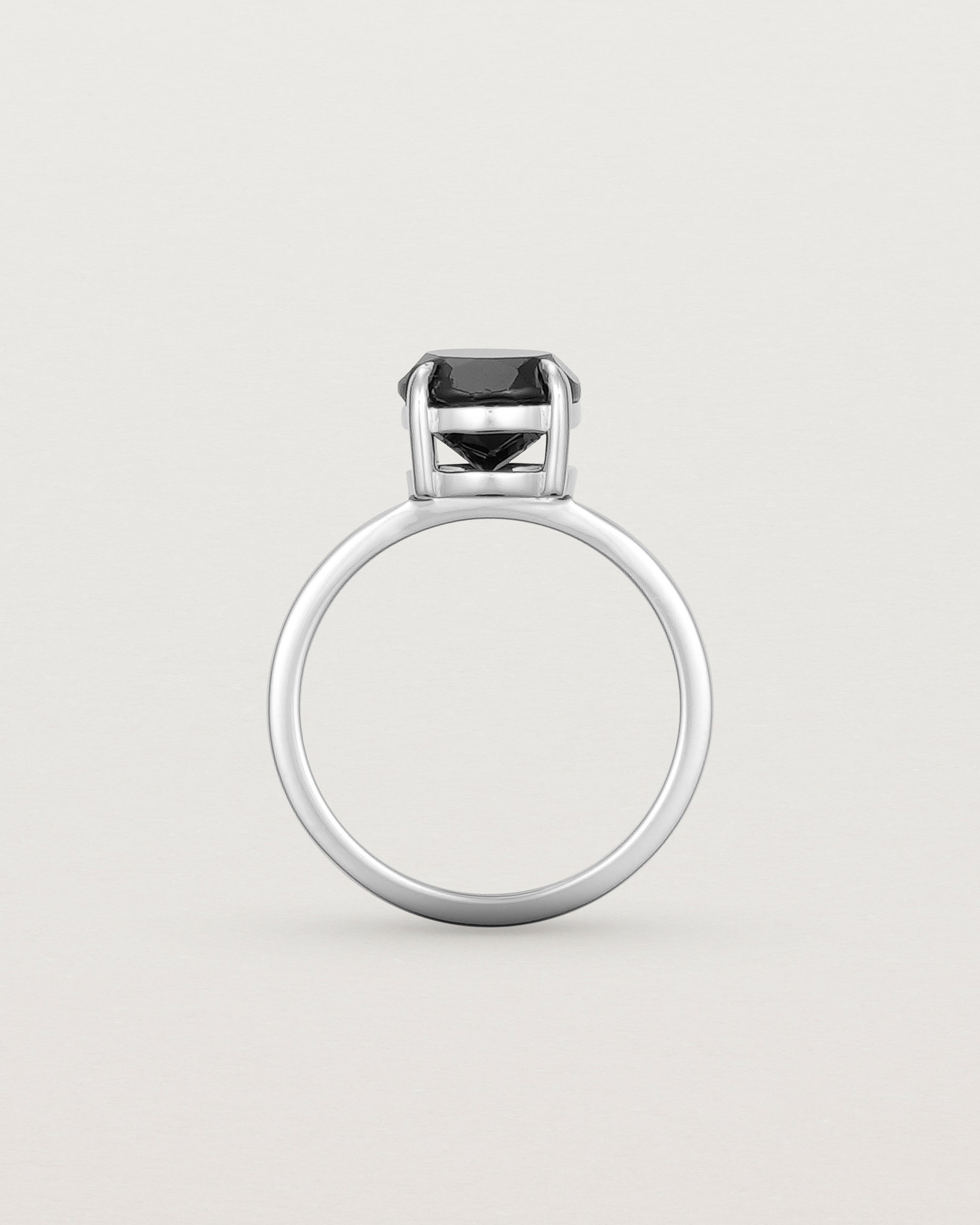 Standing view of the Una Round Solitaire | Black Spinel | White Gold