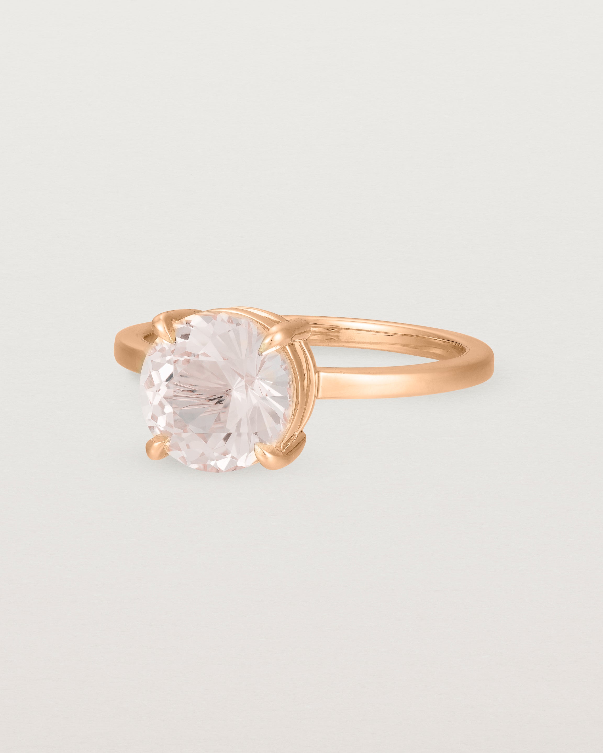 Angled view of the Una Round Solitaire | Morganite | Rose Gold.