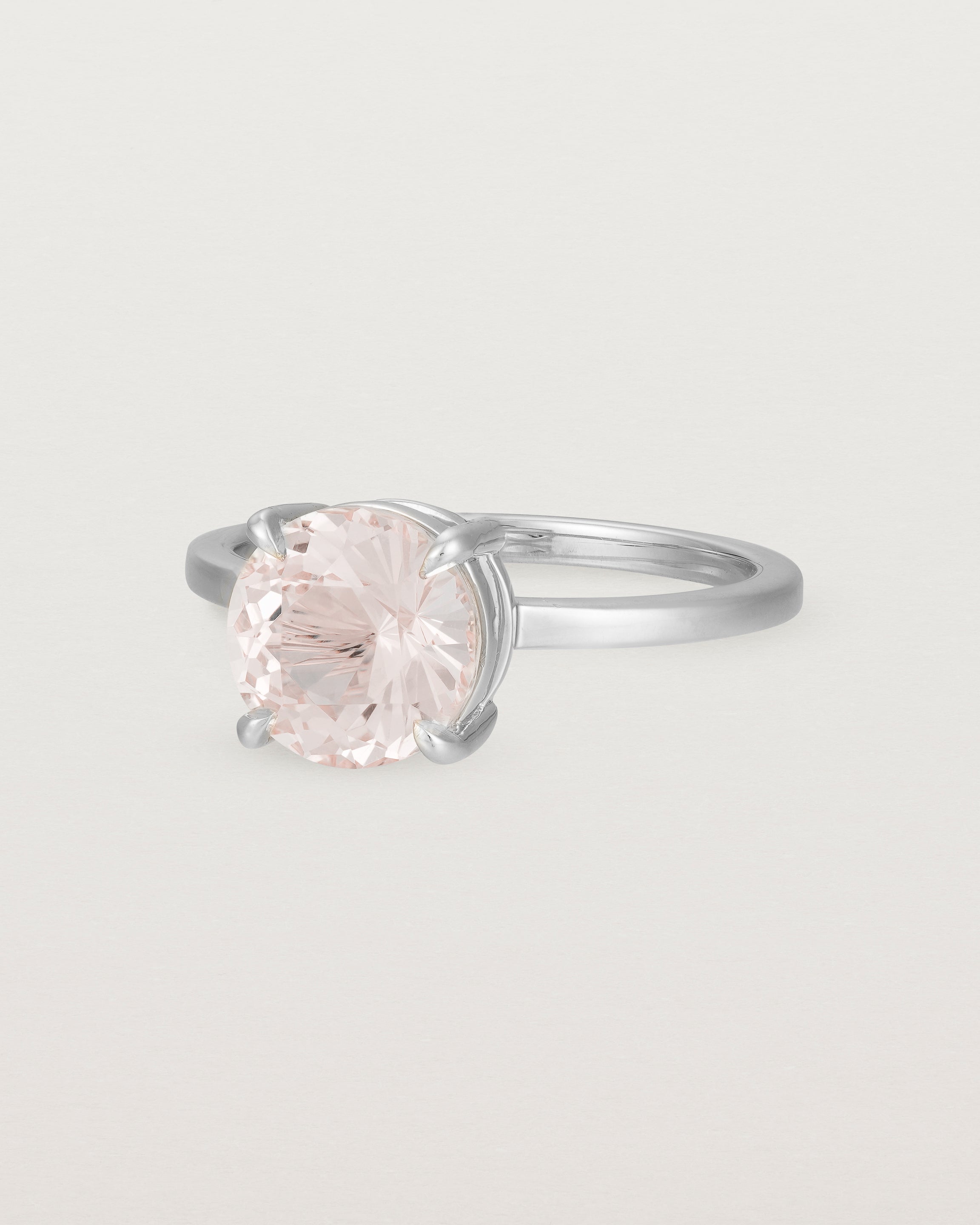 Angled view of the Una Round Solitaire | Morganite | Yellow Gold