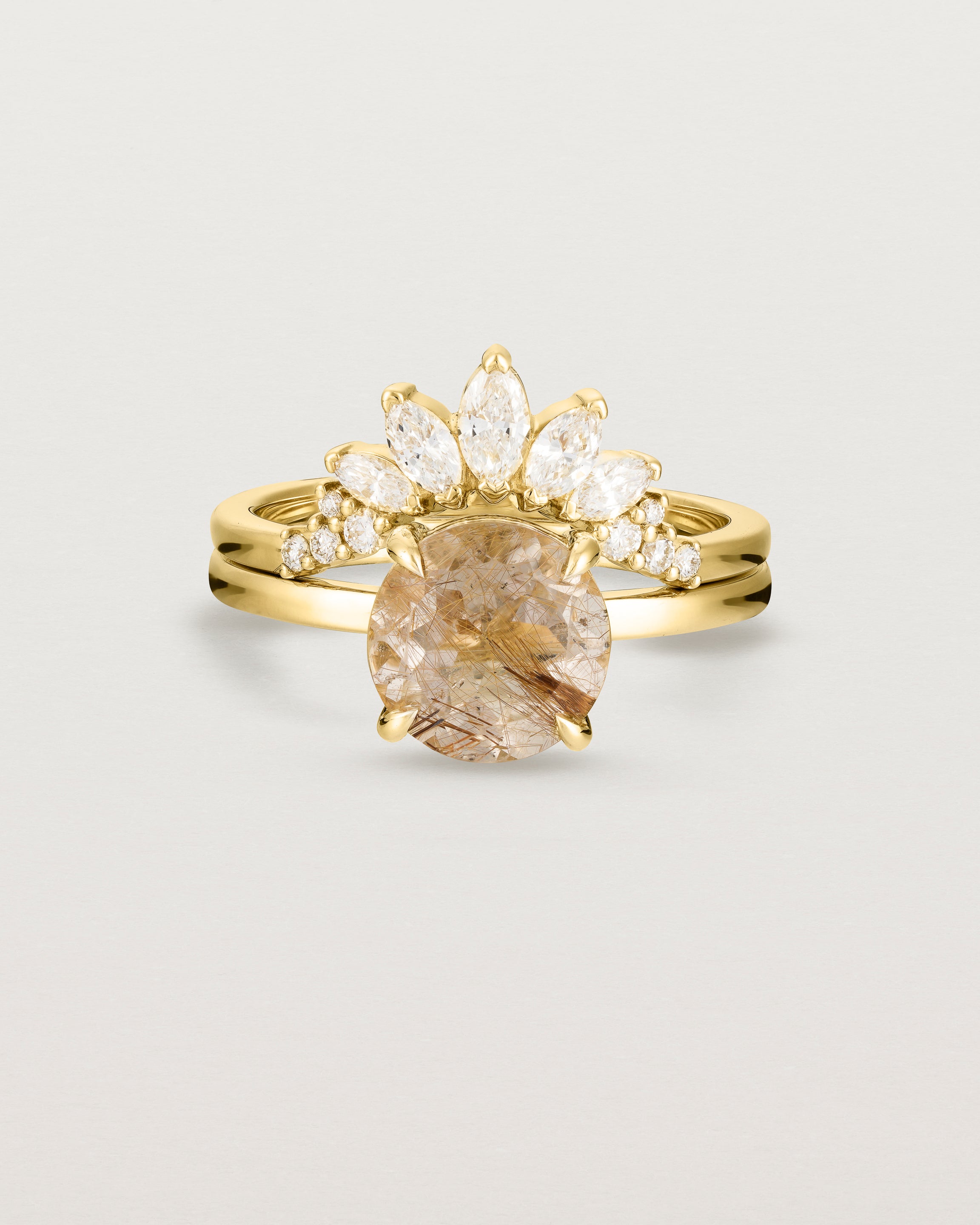 Front view of the Front view of the Una Round Solitaire | Rutilated Quartz | Yellow Gold stacked with the Camille Crown Ring.