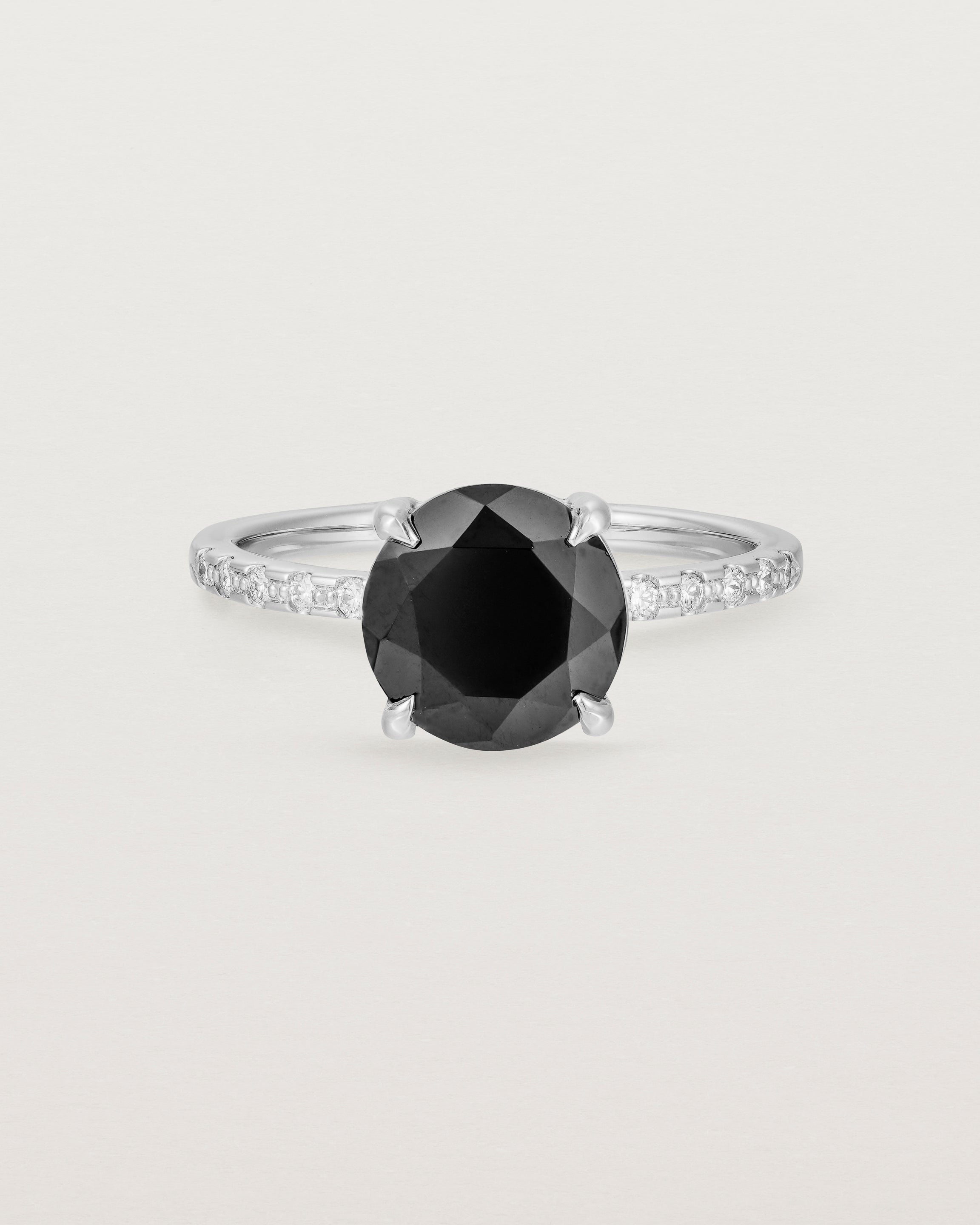 Front view of the Una Round Solitaire | Black Spinel | White Gold with Cascade Shoulders