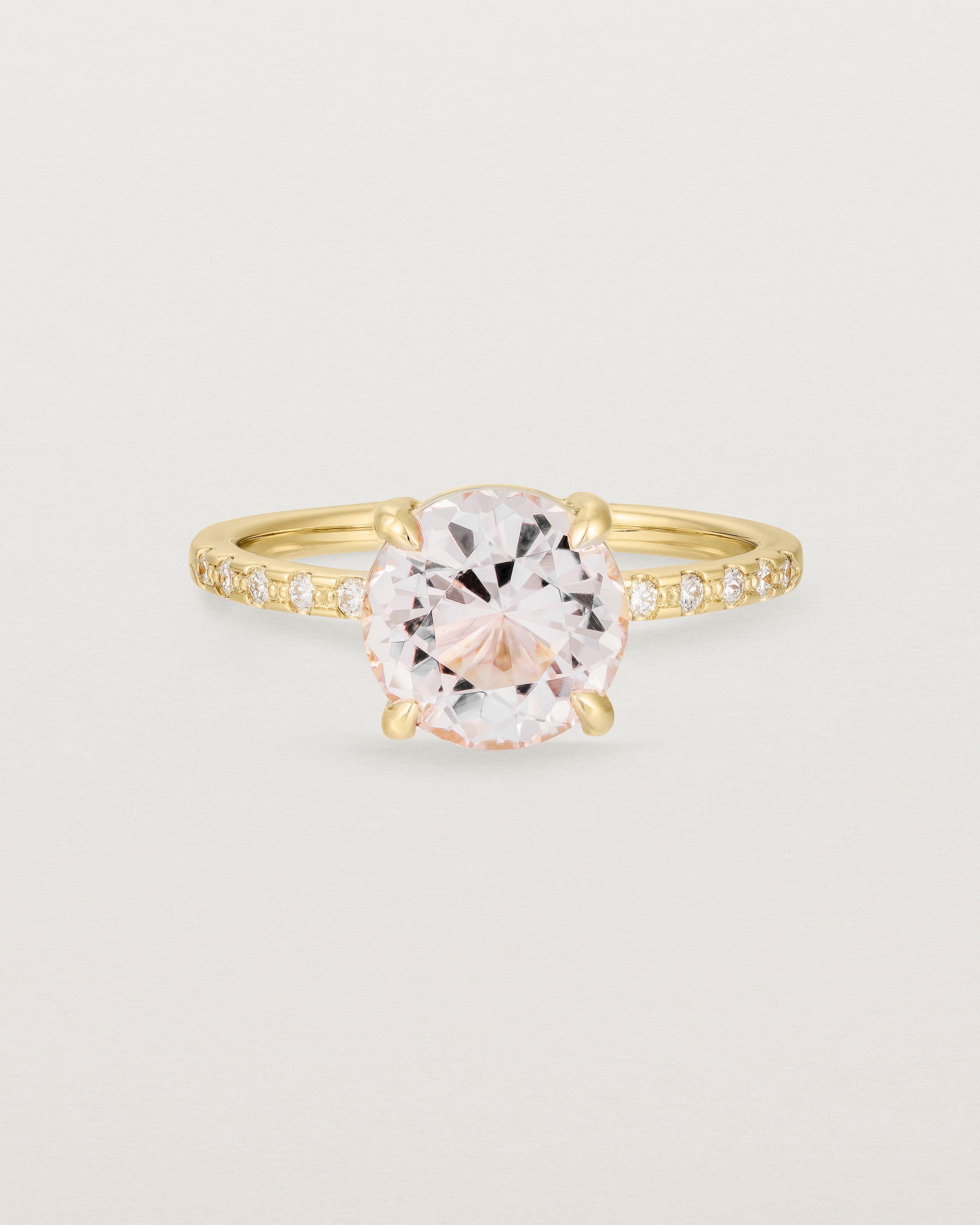 Front view of the Una Round Solitaire | Morganite | Yellow Gold with cascade Diamond shoulders.