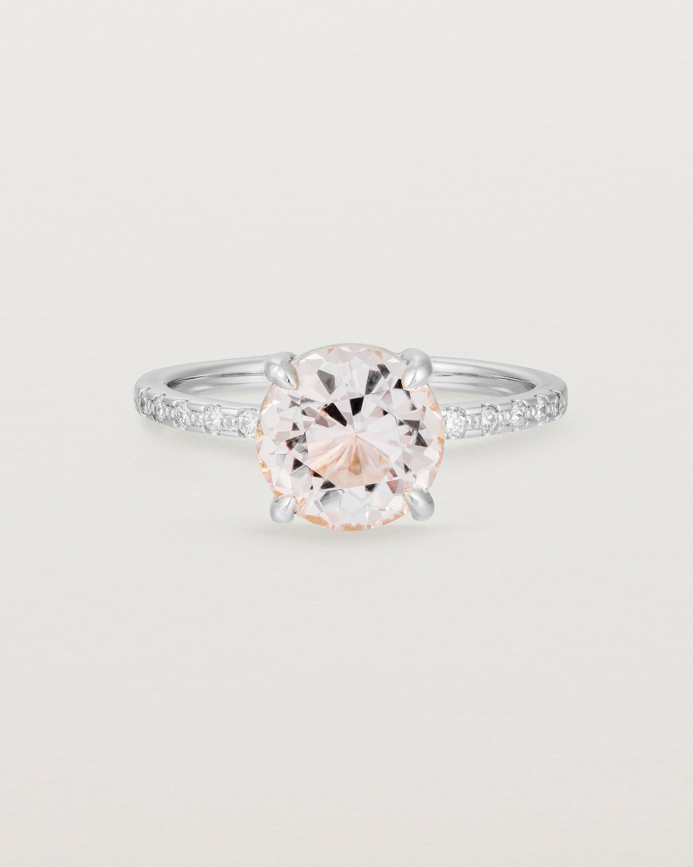 Front view of the Una Round Solitaire | Morganite | White Gold with cascade Diamond shoulders.