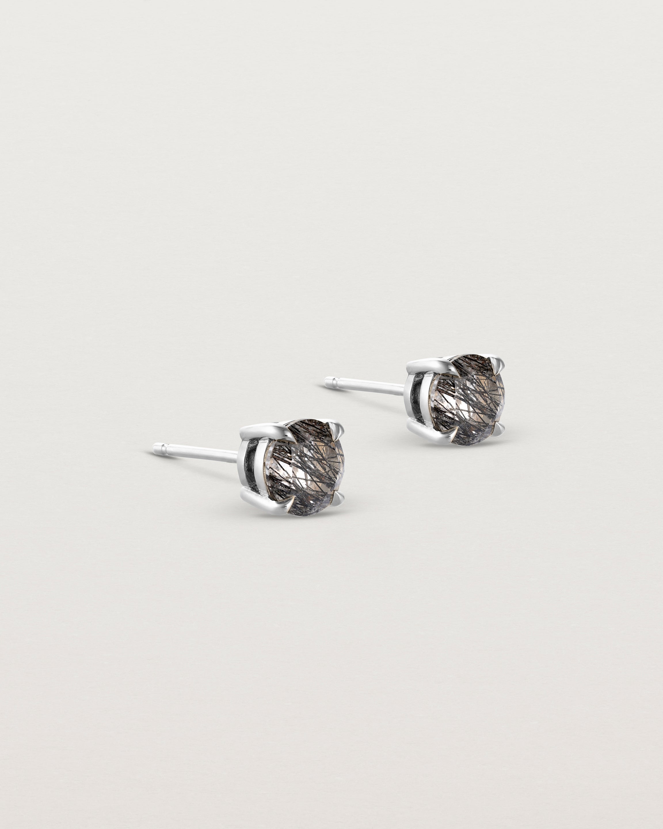Angled view of the Una Studs | Tourmalinated Quartz in sterling silver.