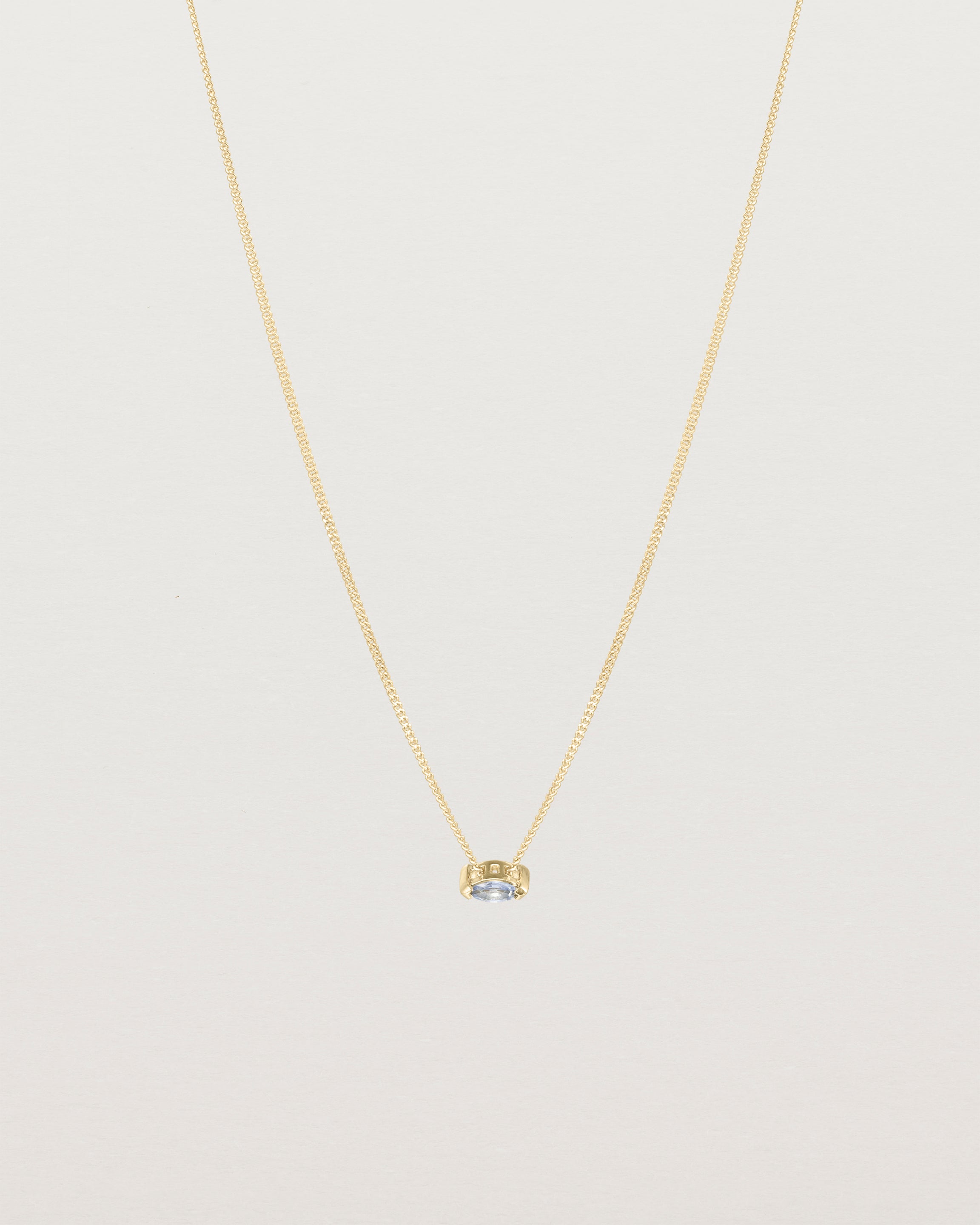 Full view of the Vega Slider Necklace | Sapphire | Yellow Gold.