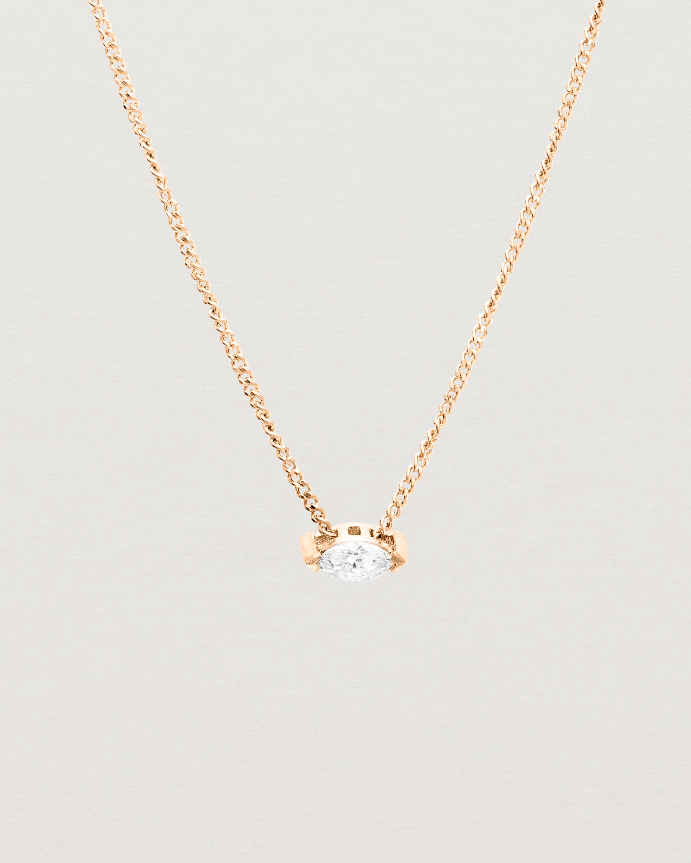 Close up view of the Vega Slider Necklace | Diamond | Rose Gold.