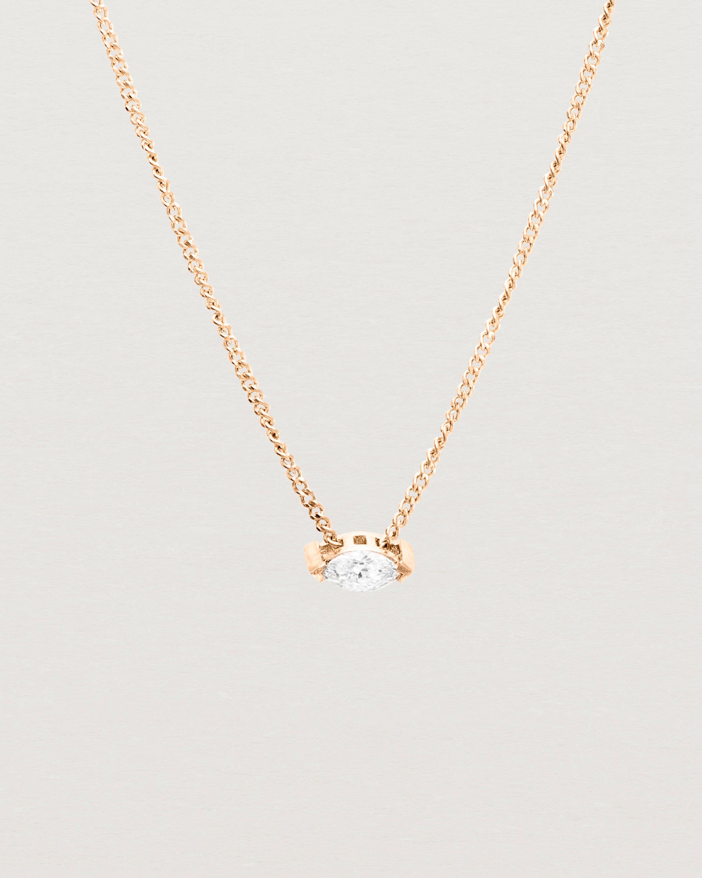 Close up view of the Vega Slider Necklace | Diamond | Rose Gold.