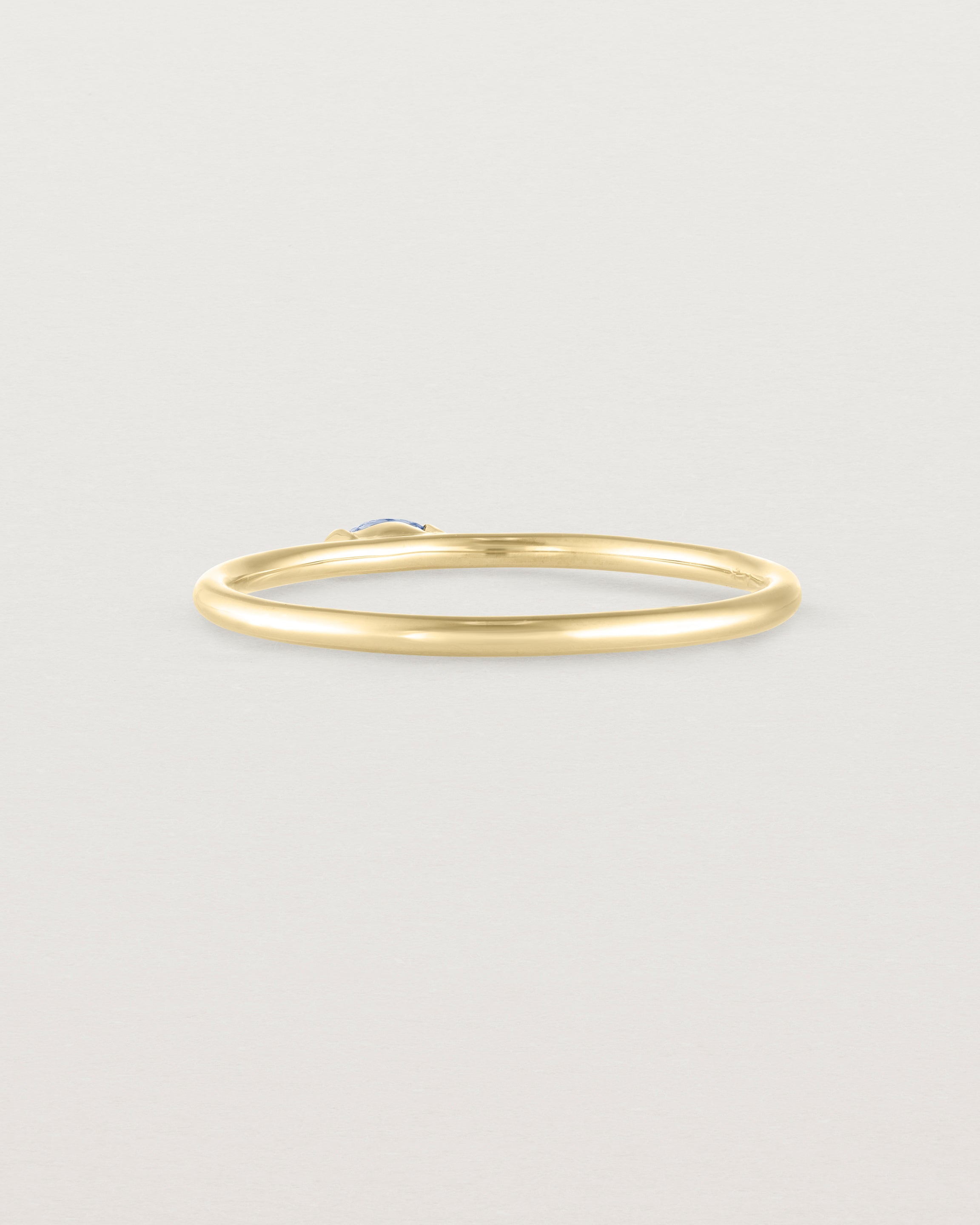 Back view of the Vega Stacking Ring | Sapphire in yellow gold.