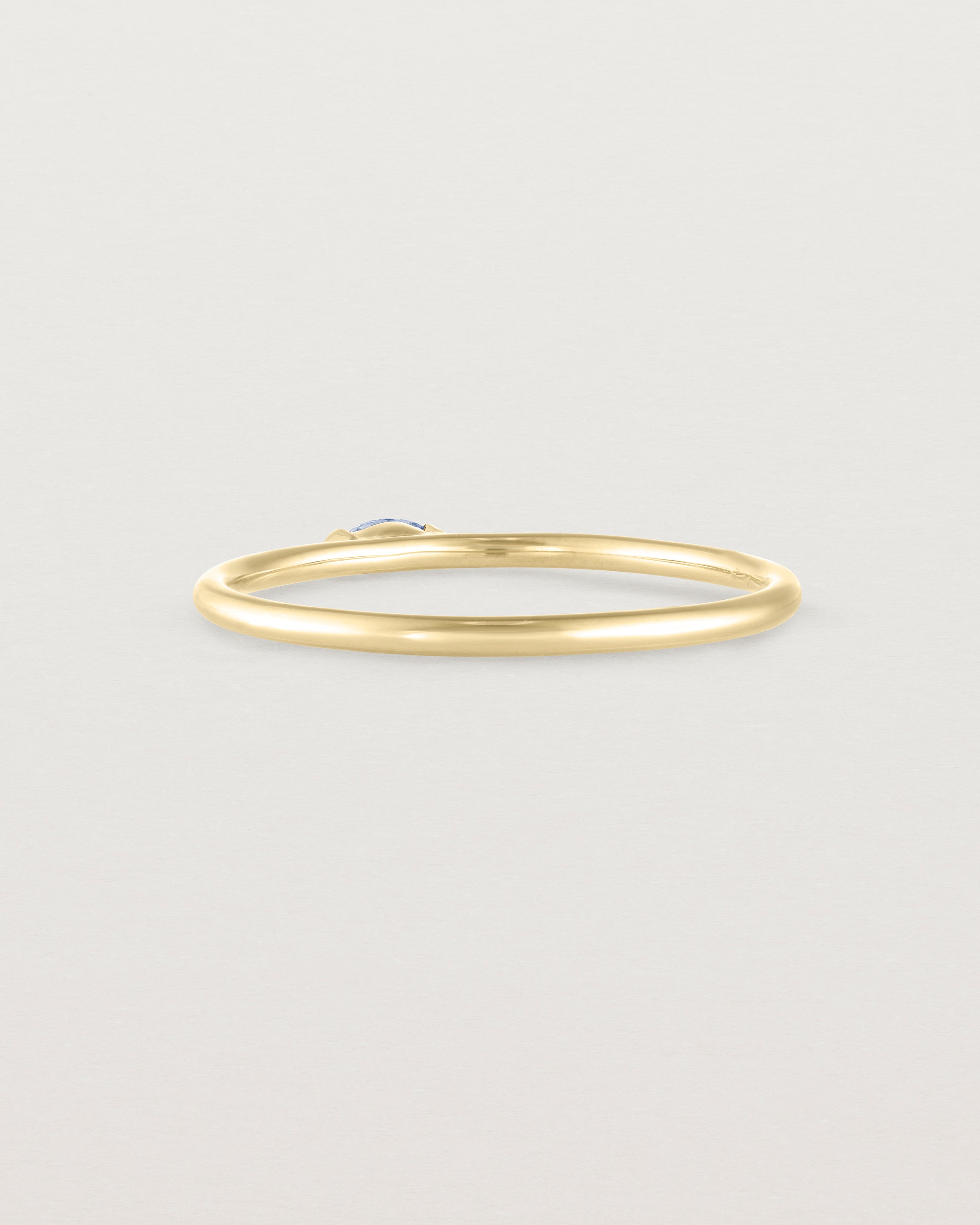 Back view of the Vega Stacking Ring | Sapphire in yellow gold.