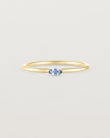 Front view of the Vega Stacking Ring | Sapphire in yellow gold.