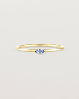 Front view of the Vega Stacking Ring | Sapphire in yellow gold.