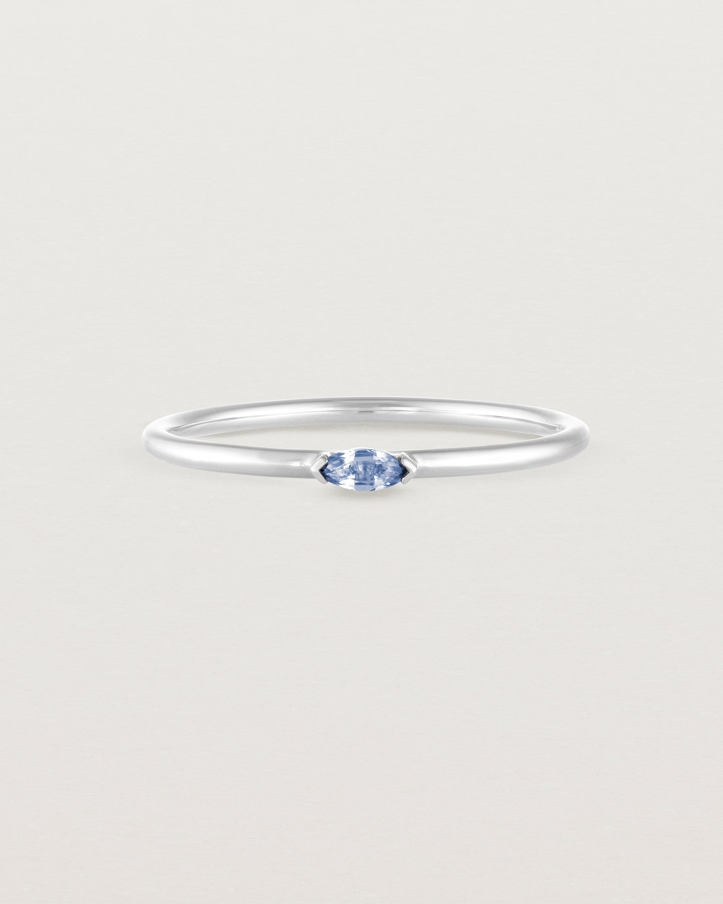 Front view of the Vega Stacking Ring | Sapphire in white gold.
