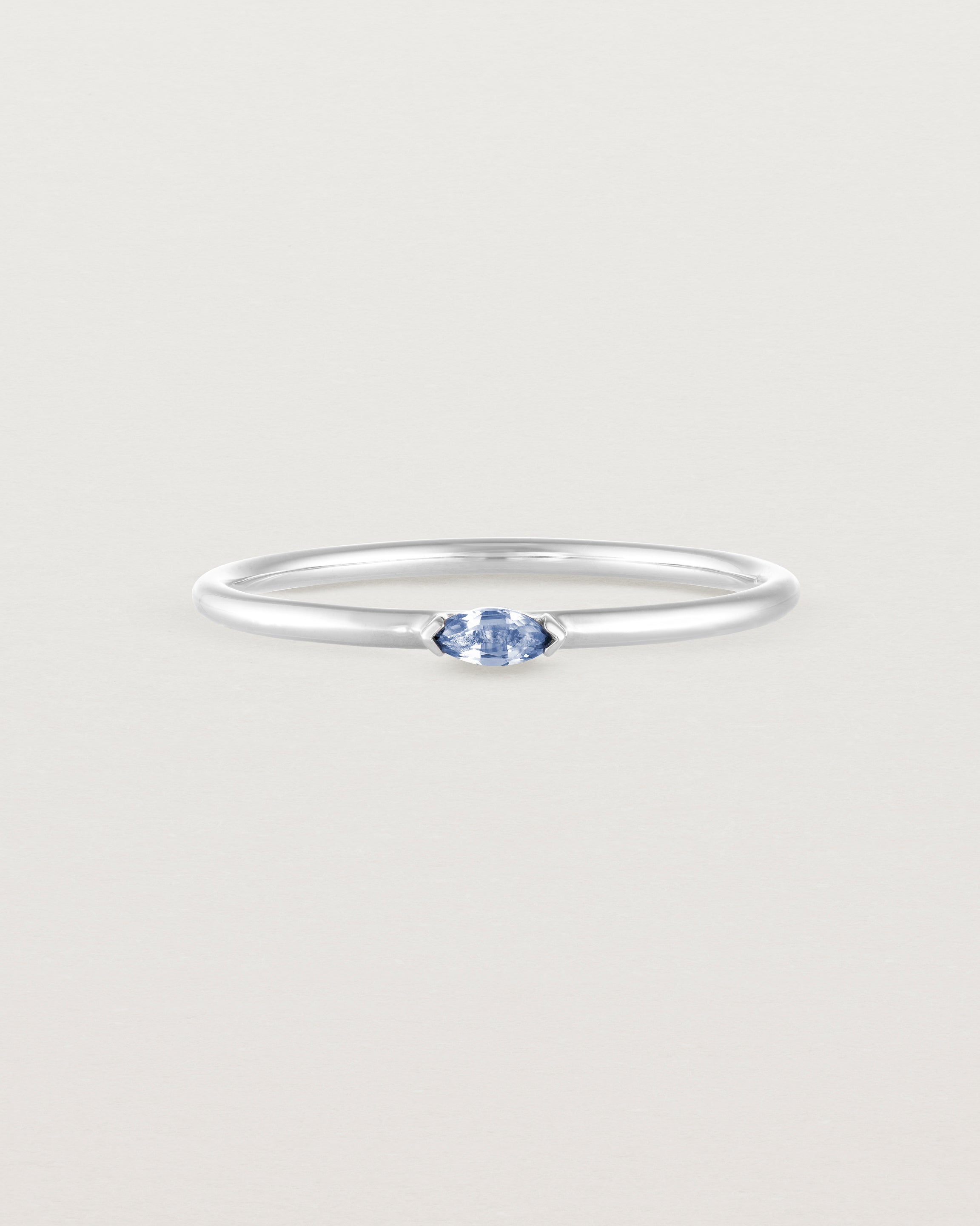 Front view of the Vega Stacking Ring | Sapphire in white gold.