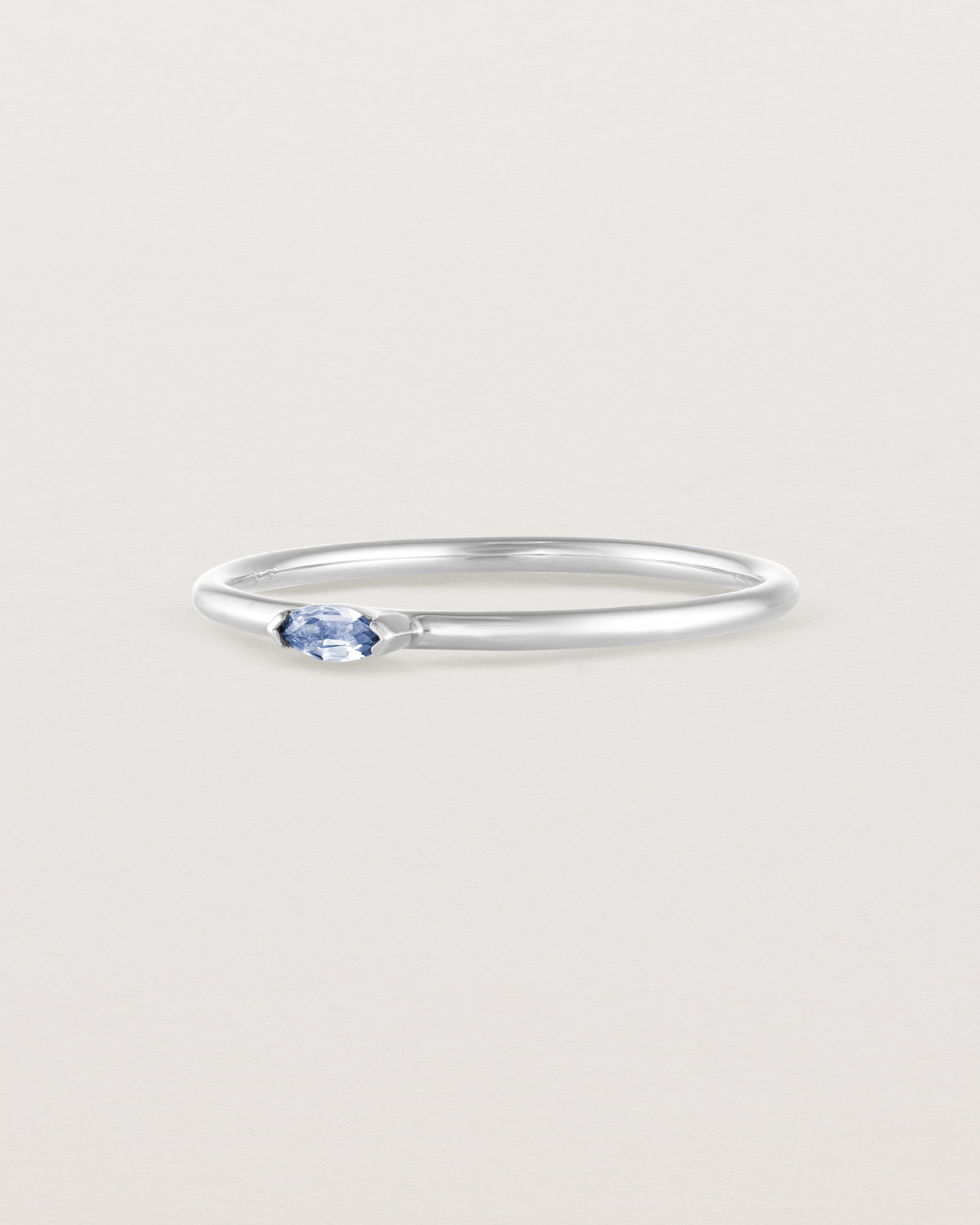 Angled view of the Vega Stacking Ring | Sapphire in white gold.