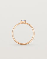 Standing view of the Vega Stacking Ring | Sapphire in rose gold.