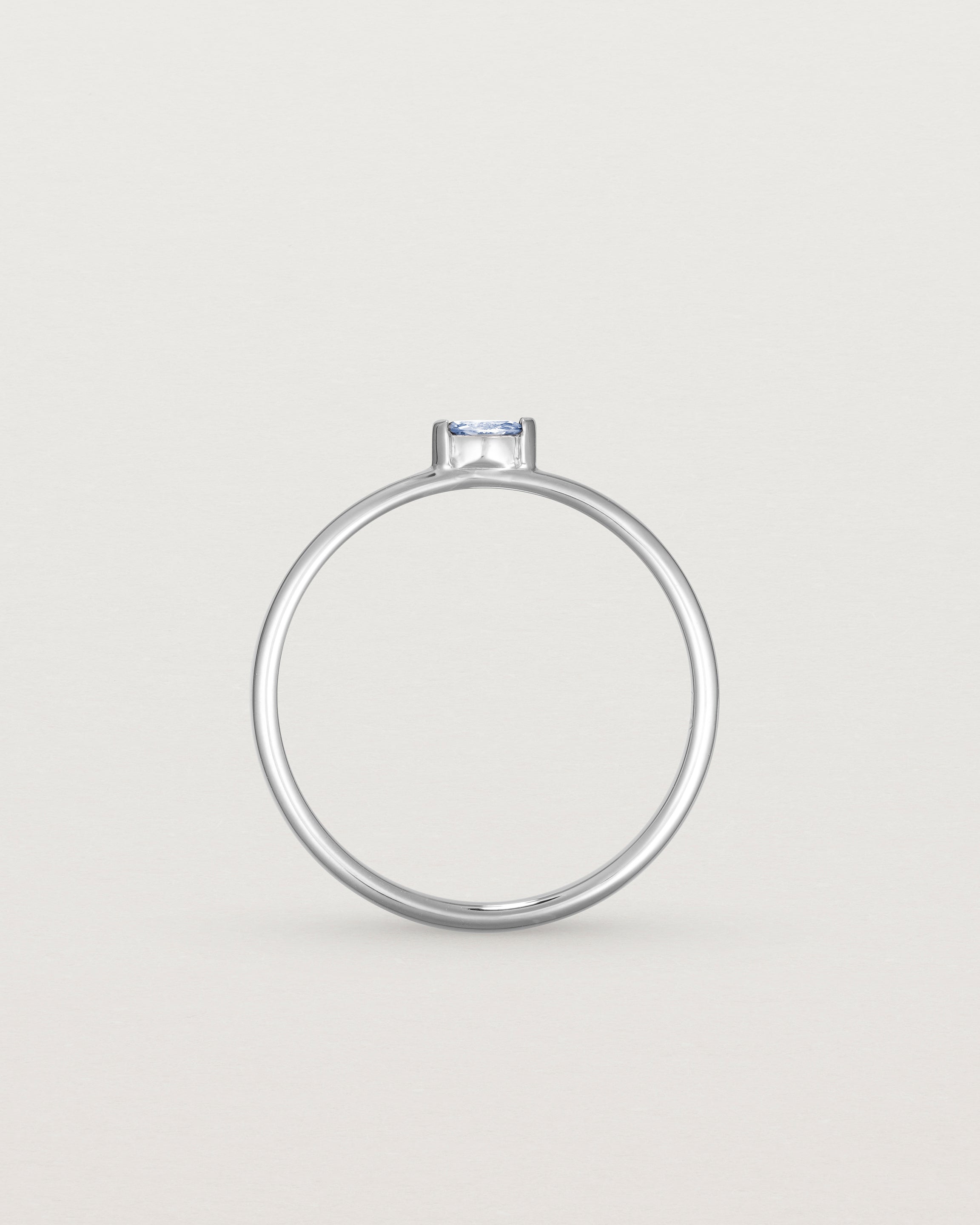 Standing view of the Vega Stacking Ring | Sapphire in white gold.