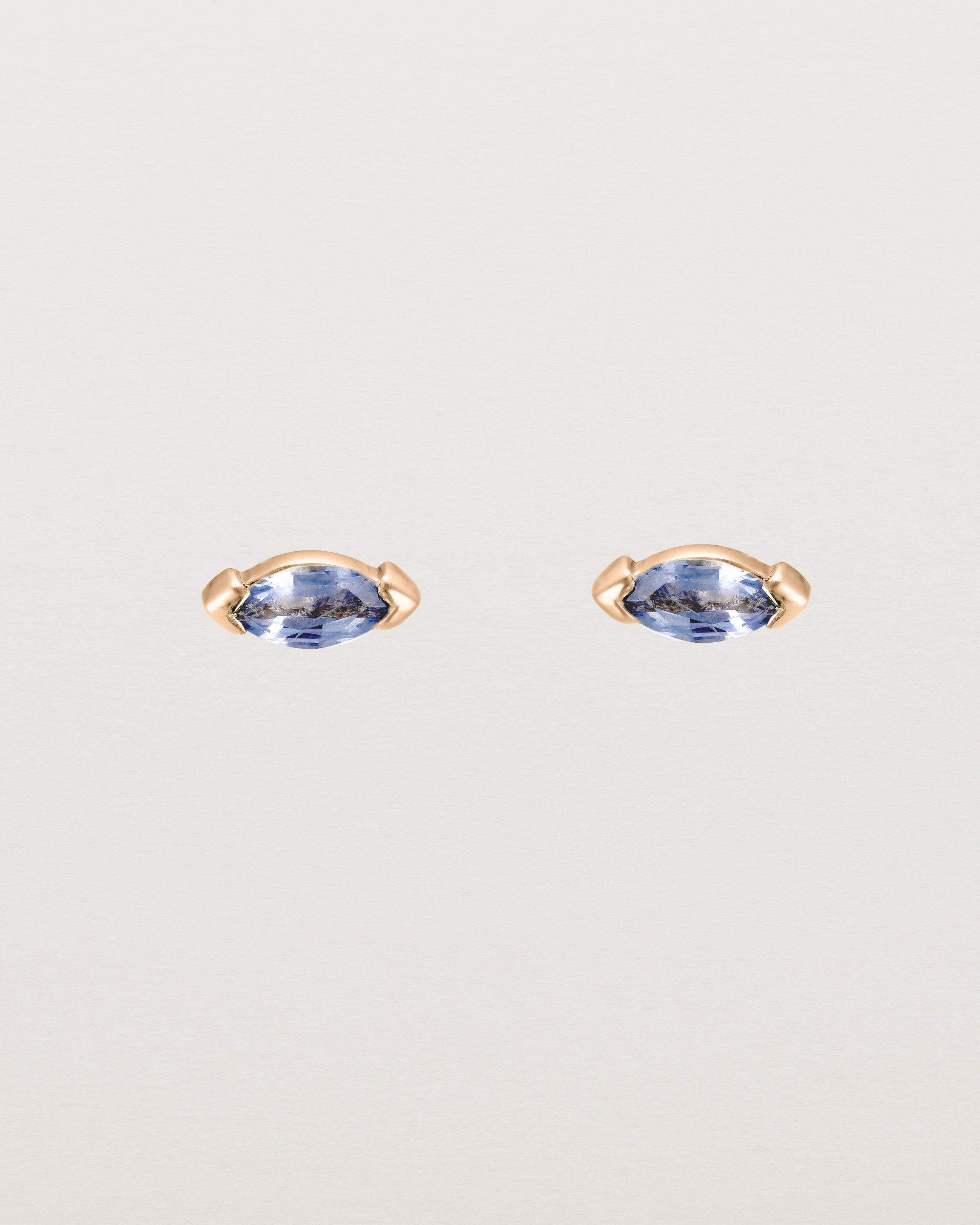 Front view of the Vega Studs | Sapphire in rose gold.
