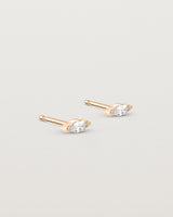Angled view of the Vega Studs | Diamond in rose gold.