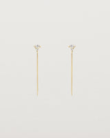 Front view of the Vega Loop Studs | Diamonds in yellow gold.