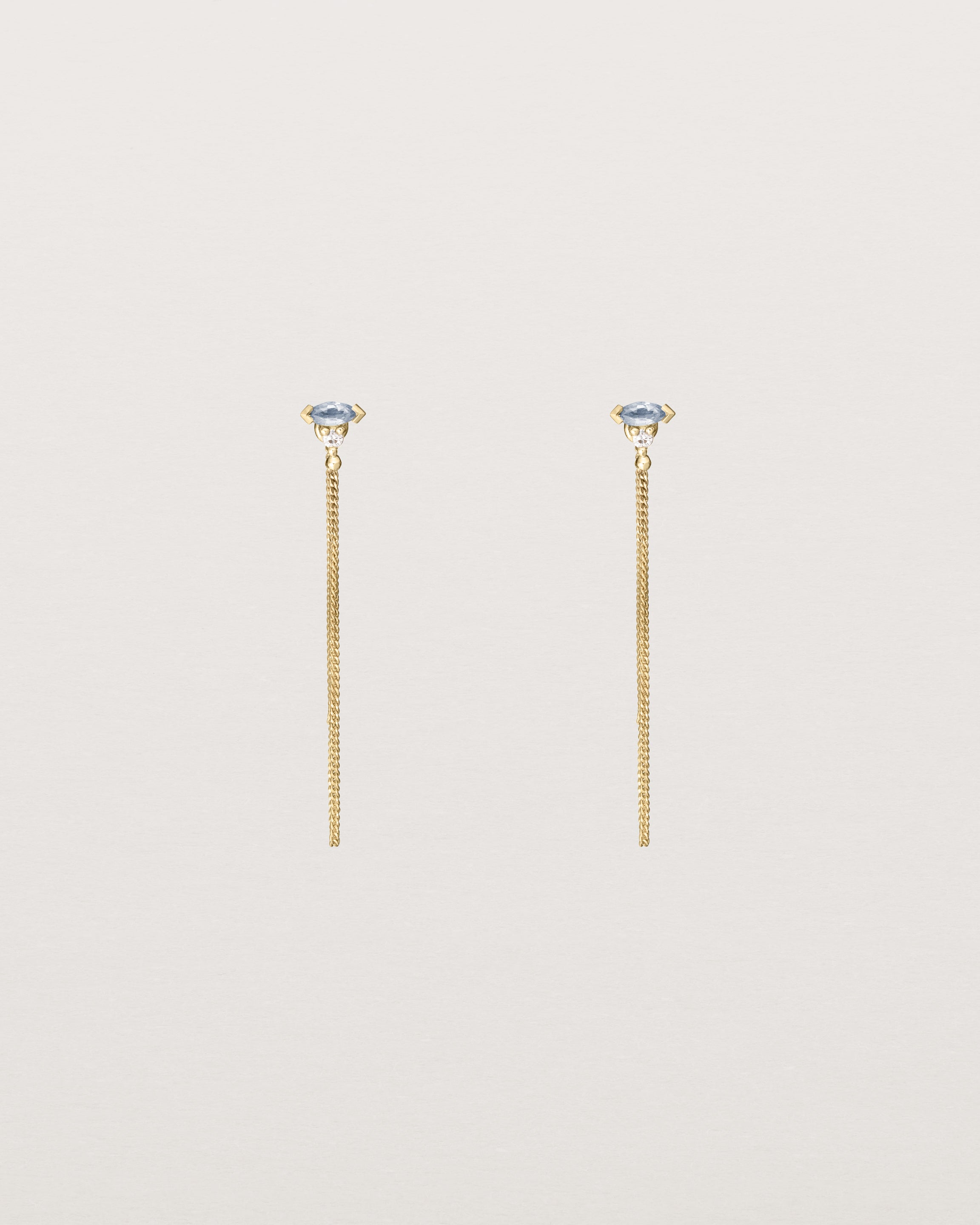 Front view of Vega Loop Studs | Sapphire & Diamond | Yellow Gold.