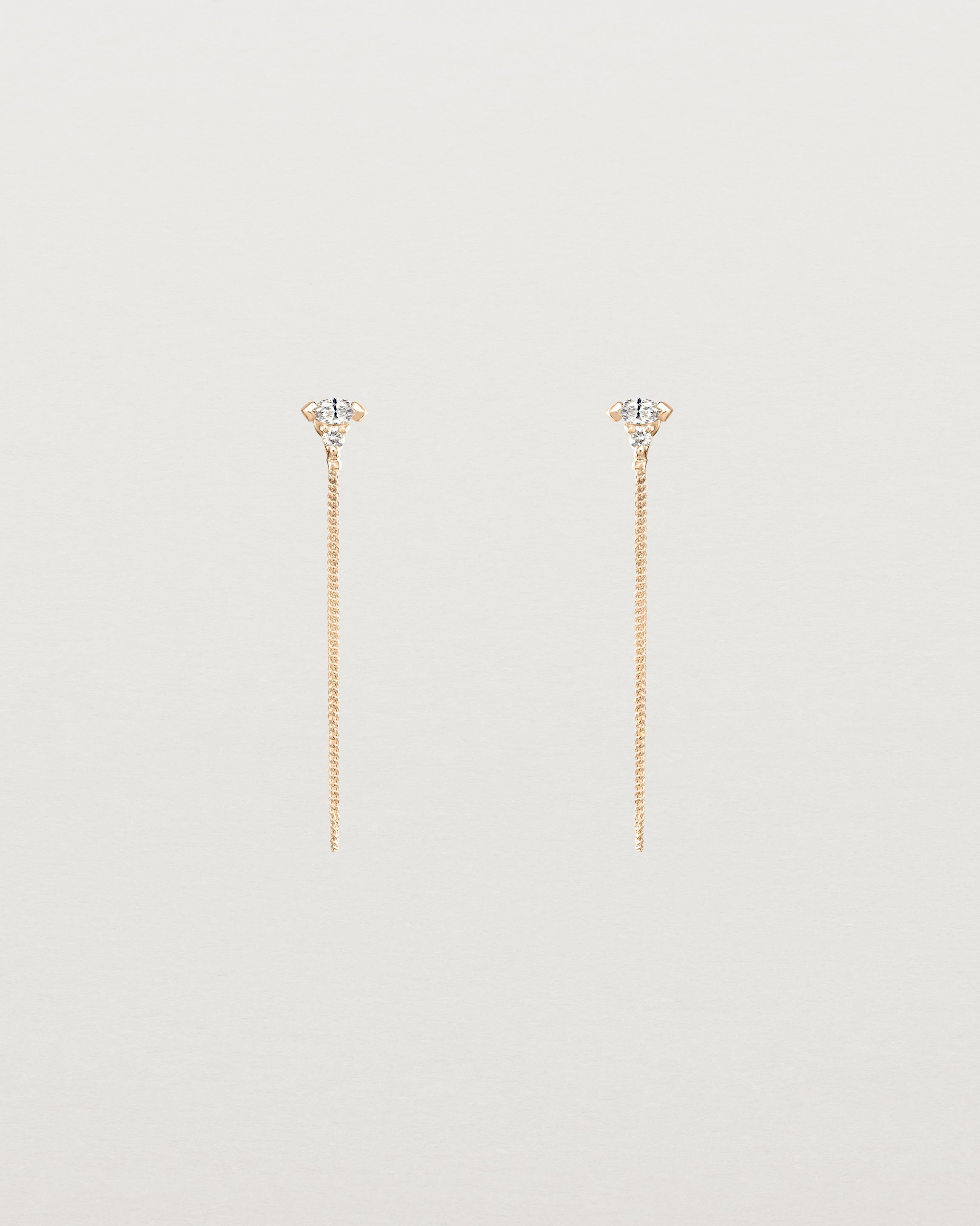 Front view of the Vega Loop Studs | Diamonds in rose gold.