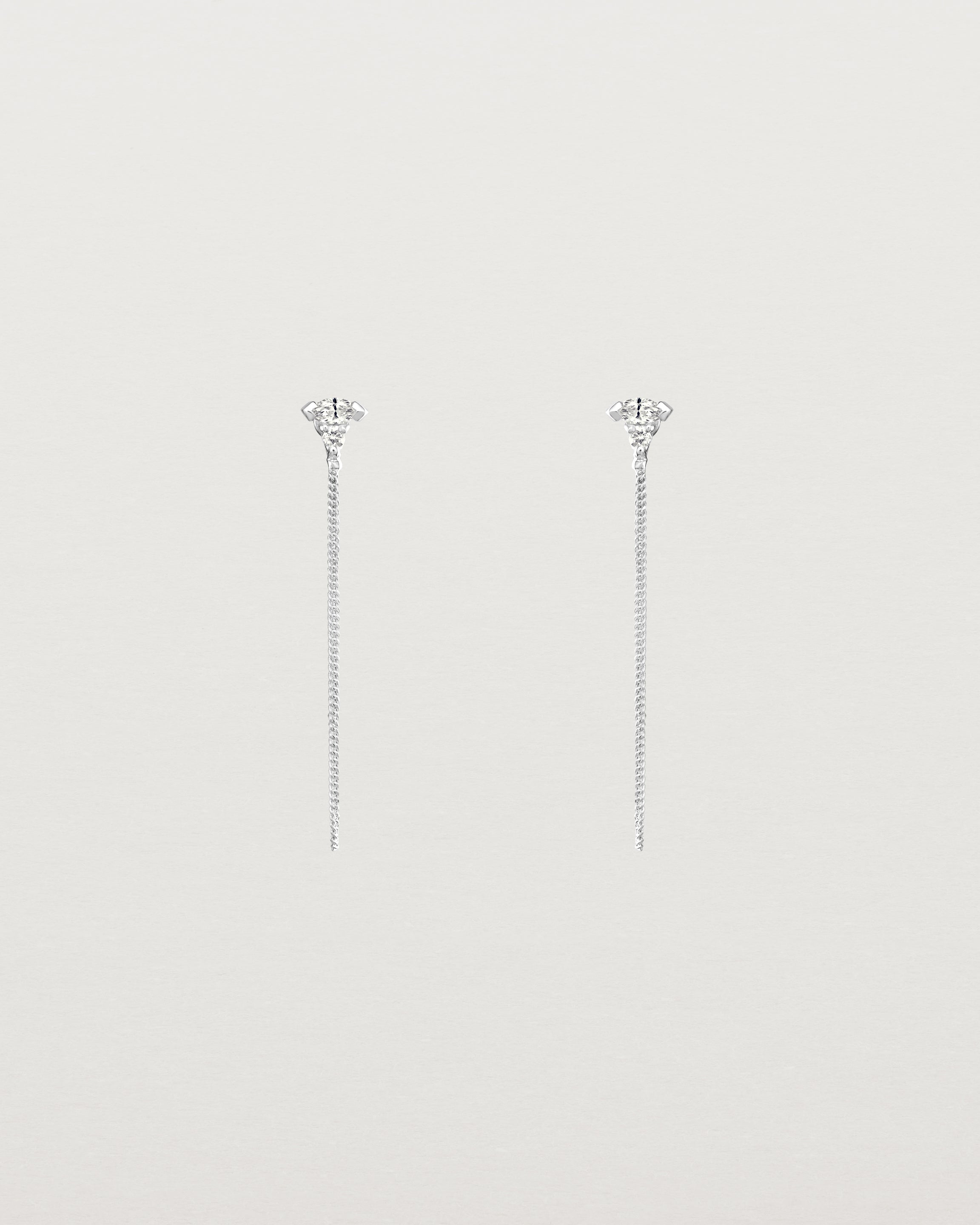 Front view of the Vega Loop Studs | Diamonds in white gold.