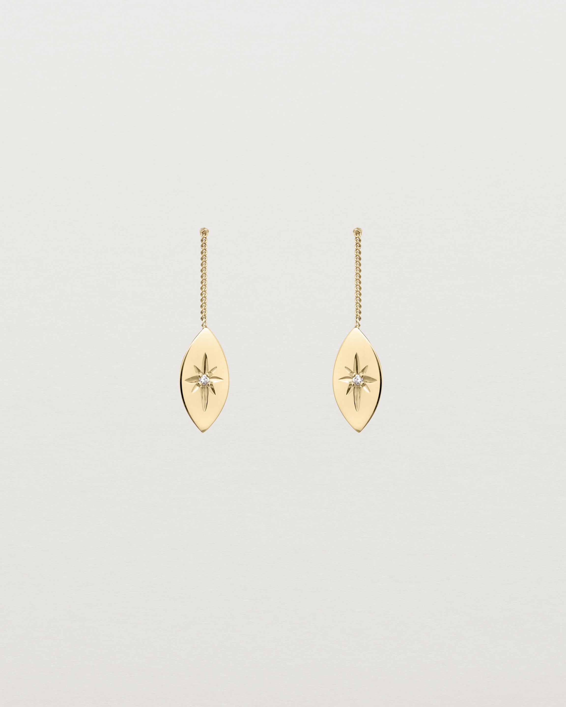 Front view of the Willow Drop Earrings | Birthstone in yellow gold with a Diamond.